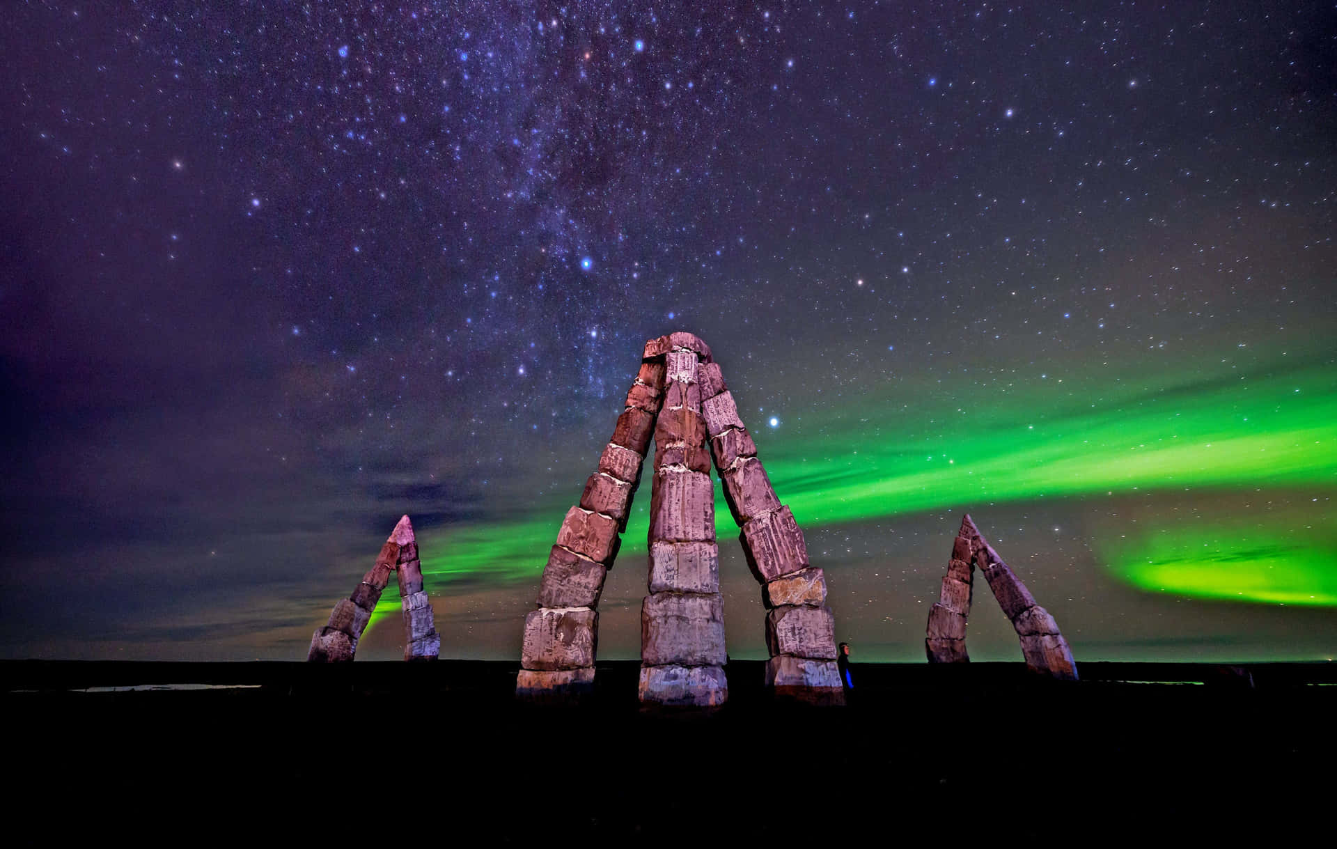 Magical Aurora Borealis Dancing Over The Serene Winter Landscape