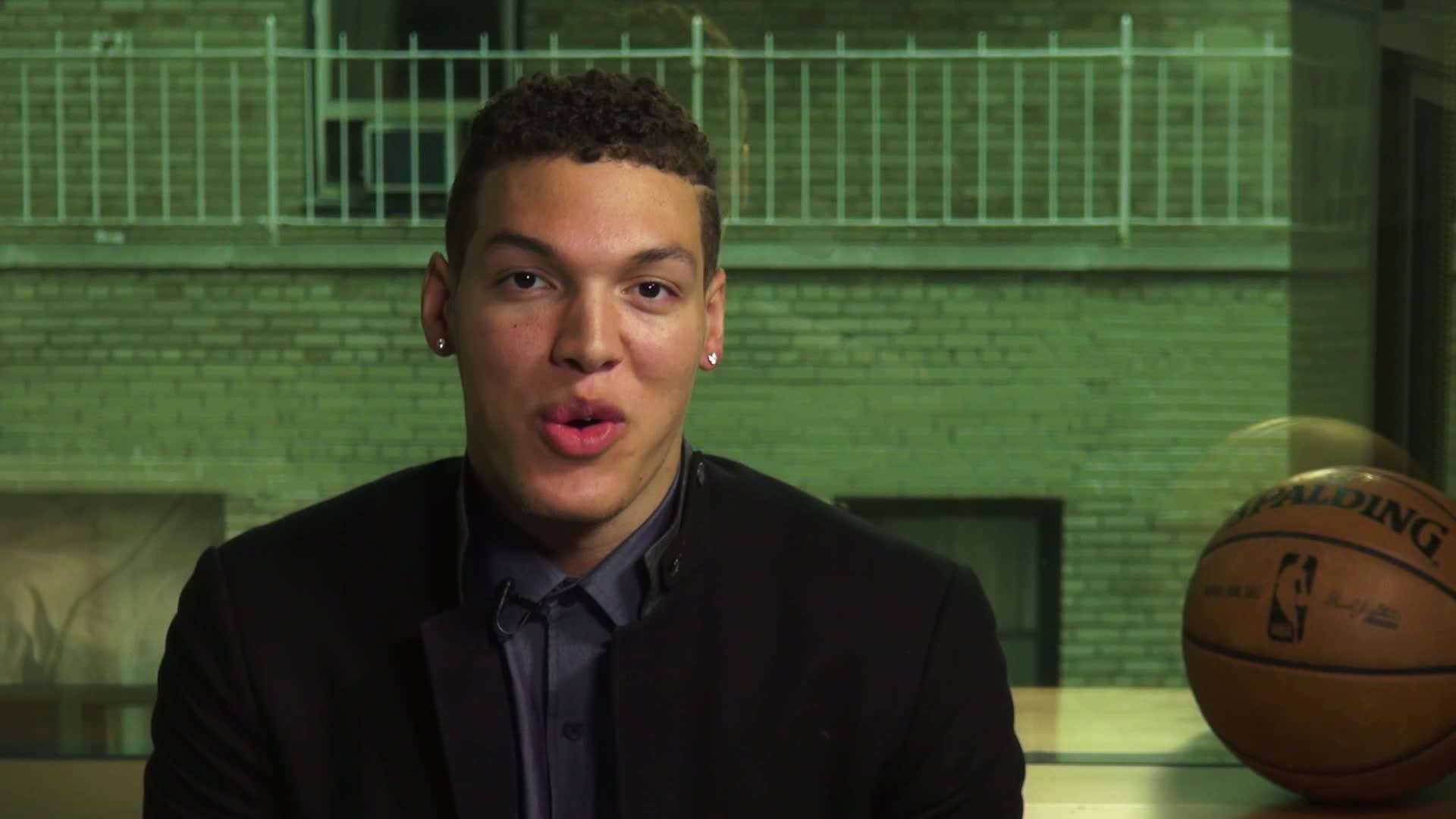 Magnificent Aaron Gordon In Action On Basketball Court Background