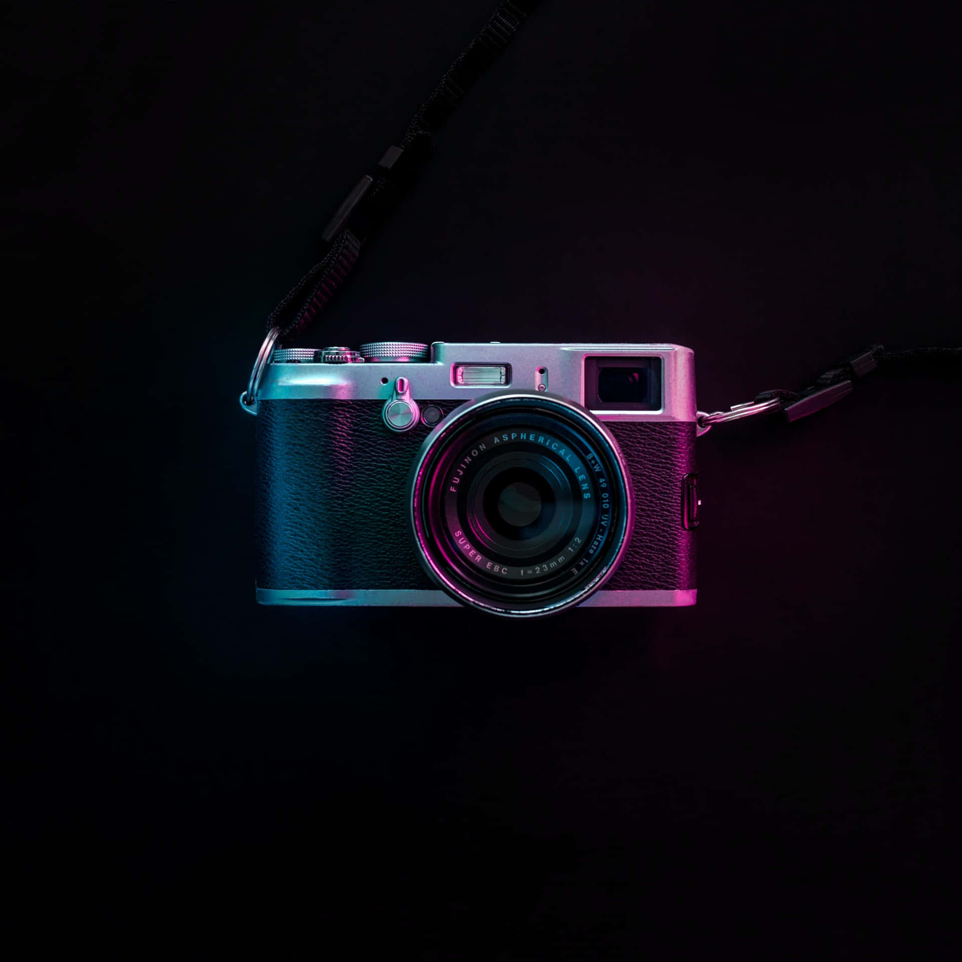 Magnificent Photography Camera Illuminated By Enchanting Purple Light Background