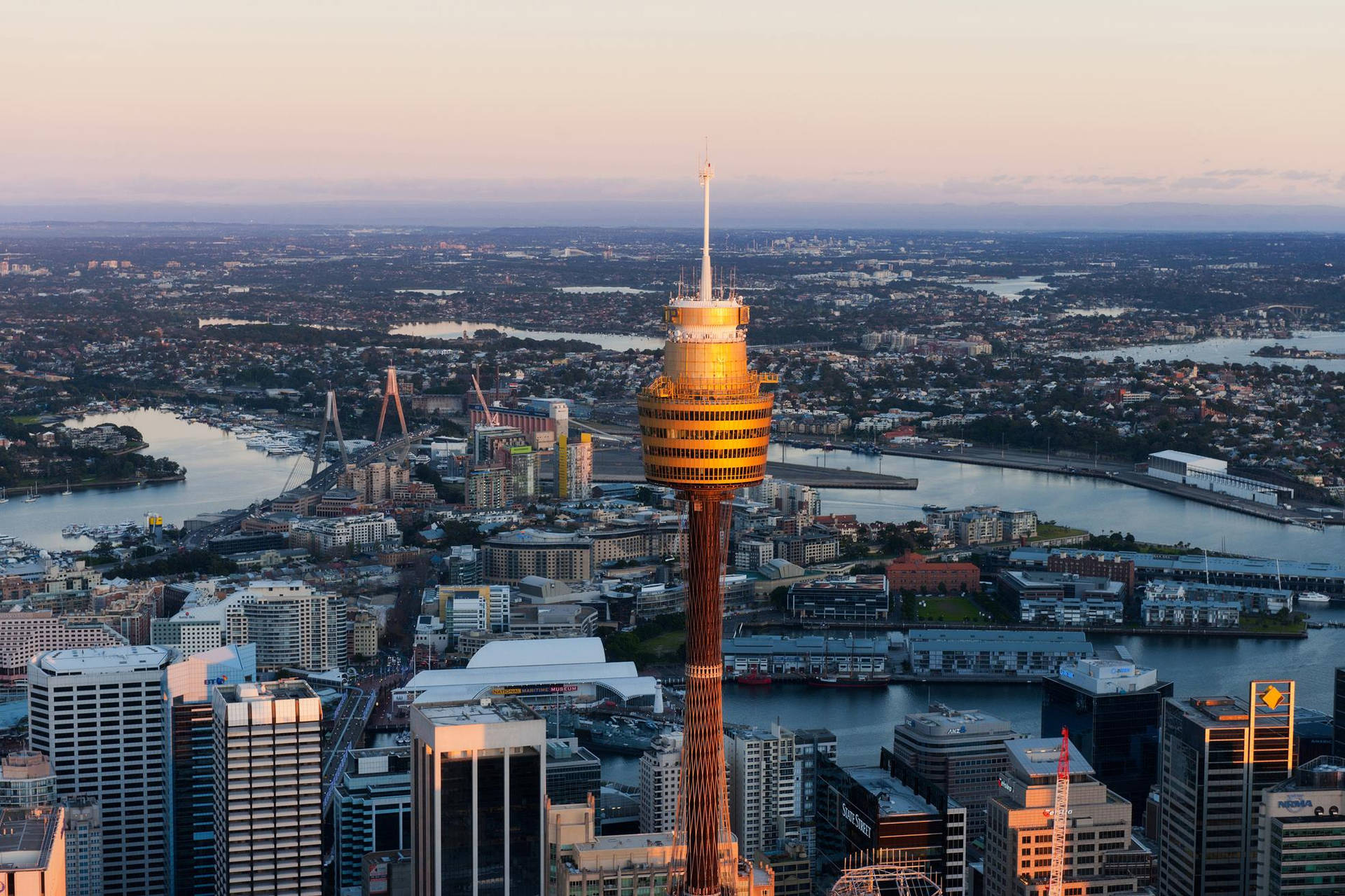 Magnificent View Of The Sydney Tower Eye Amidst The Vibrant Cityscape.