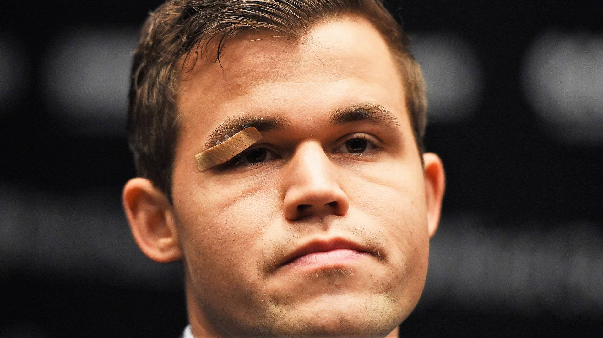 Magnus Carlsen Eye Injury Background