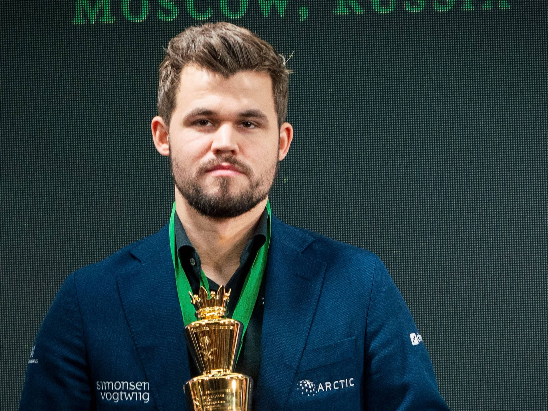 Magnus Carlsen Golden Trophy Background