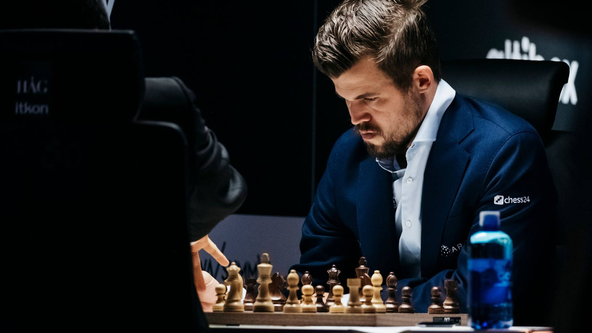 Magnus Carlsen In A Chess Match Background