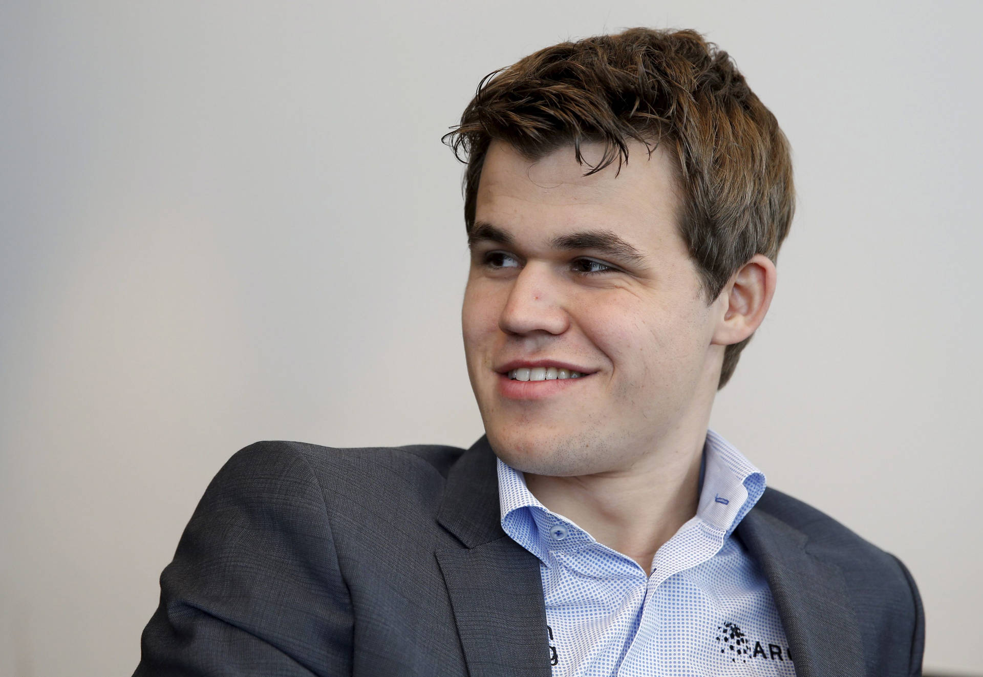 Magnus Carlsen Smile Background