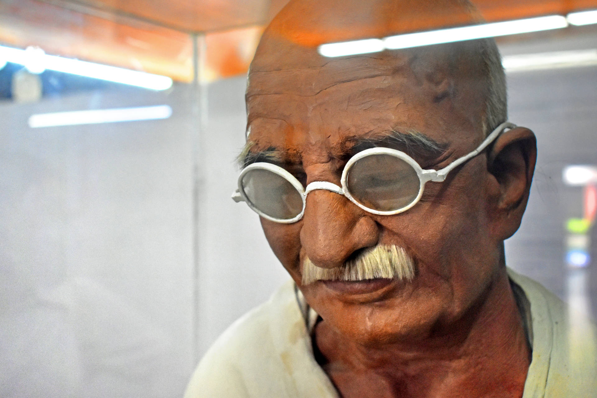 Mahatma Gandhi Sculpted Clay Statue Background