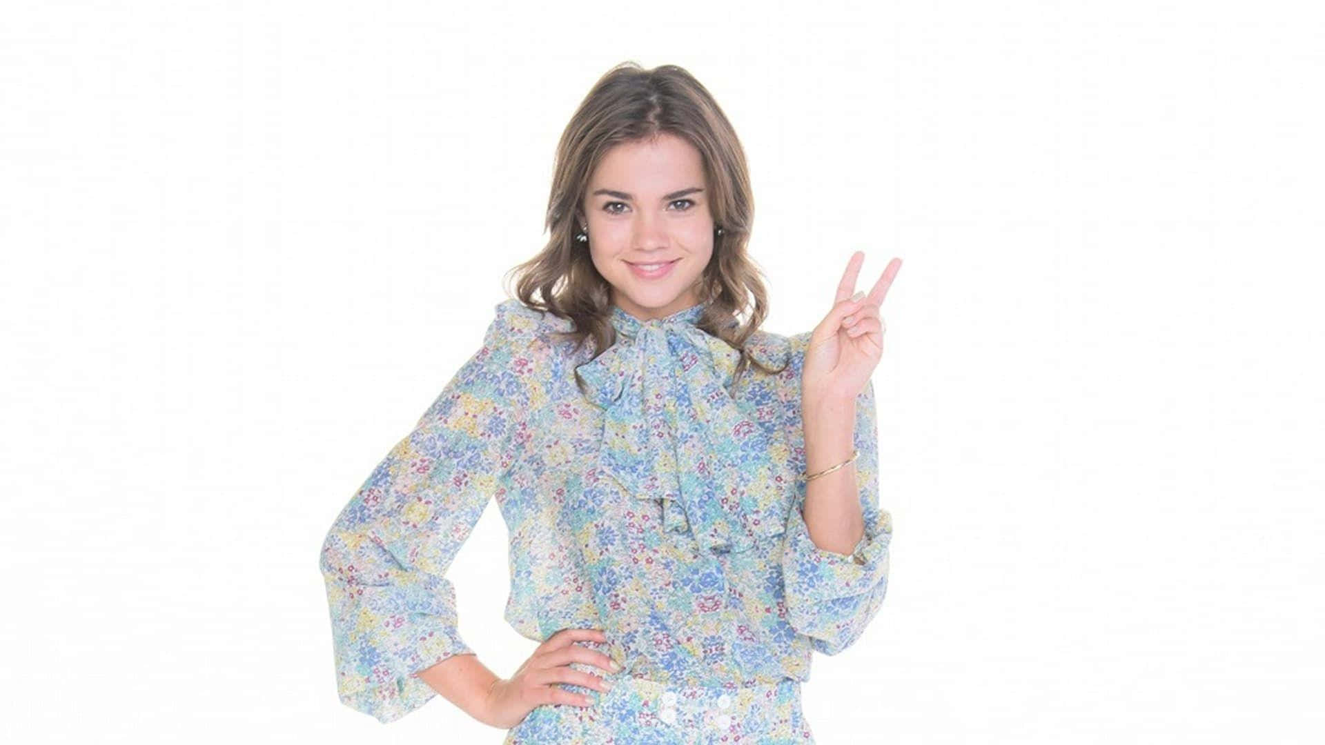 Maia Mitchell Peace Sign Pose Background