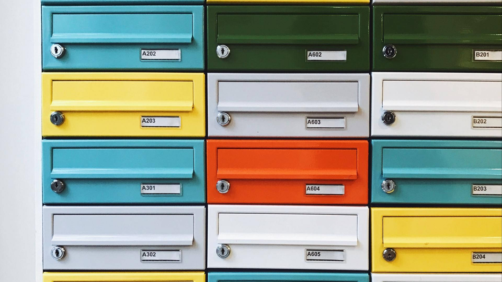 Mail And Colorful Postboxes Background