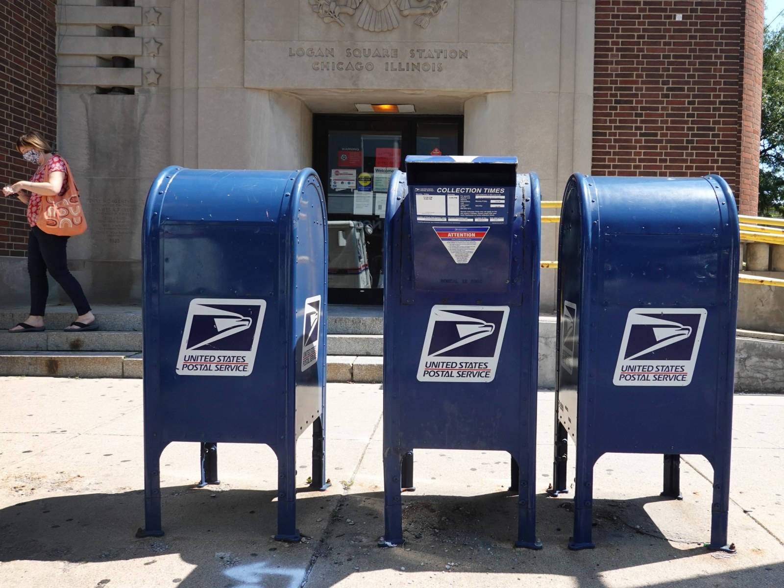 Mail Three Blue Postal Service Mailboxes