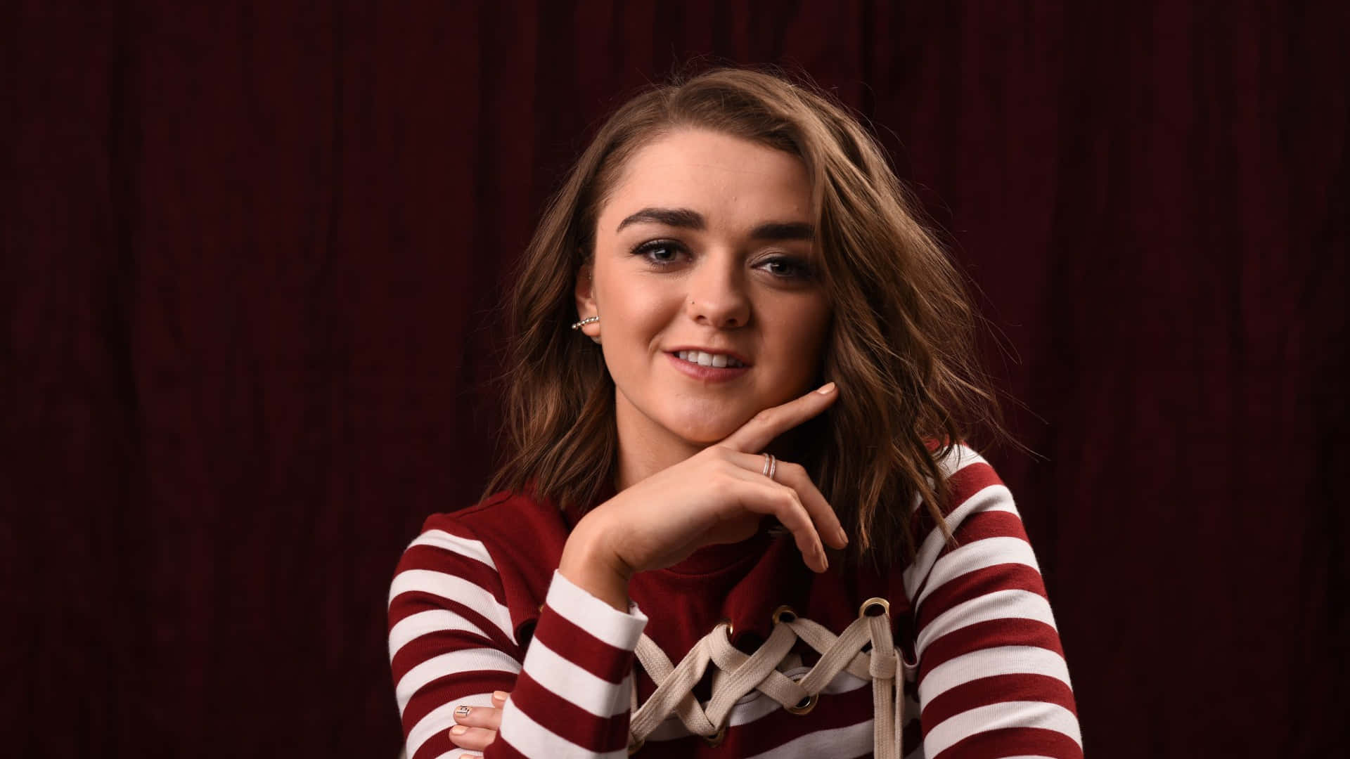 Maisie Williams Exuding Elegance And Boldness Background