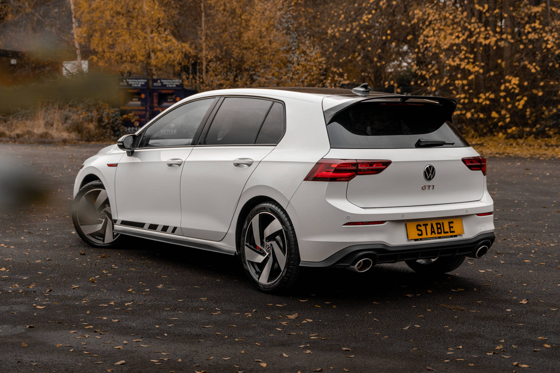 Majestic 2021 White Golf Gti Cruising On The Road. Background