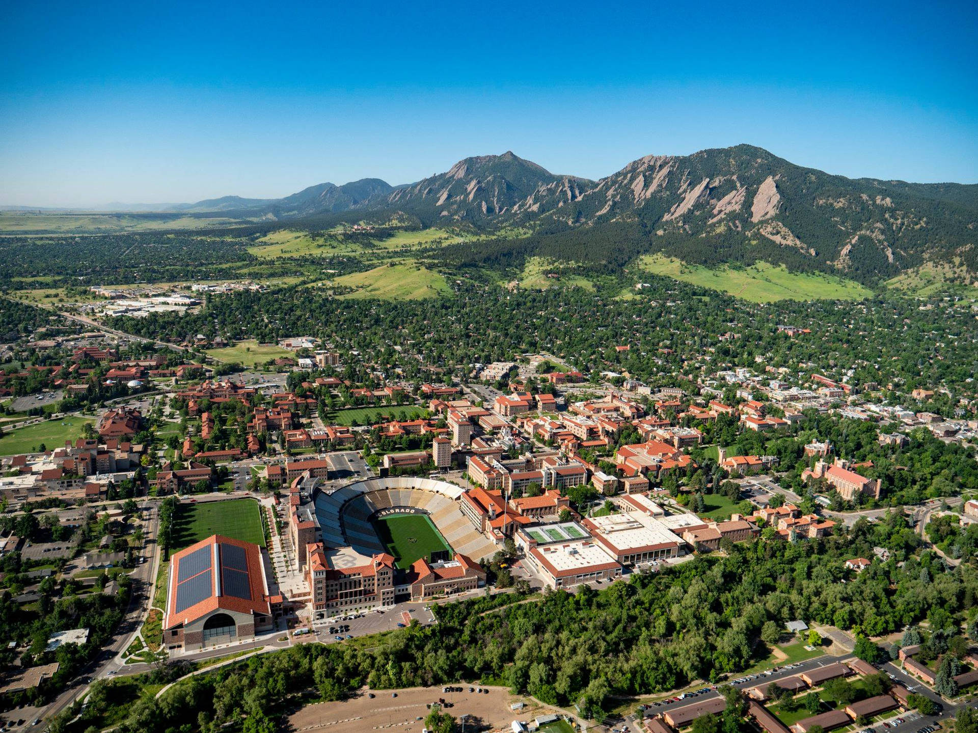 Majestic Aerial View Of University Of Colorado Campus Background