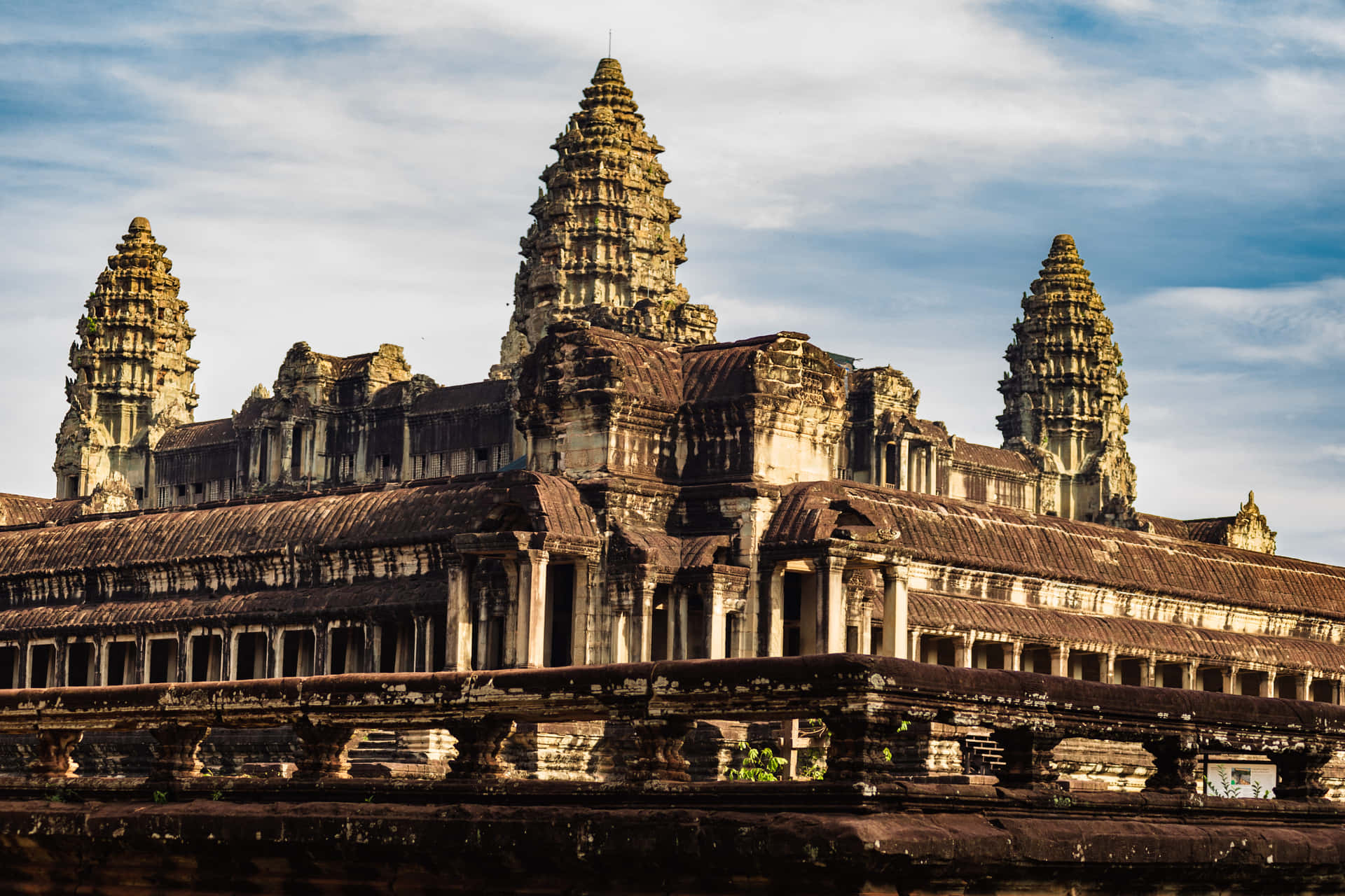 Majestic Angkor Thom Ruins In Stunning Brown Aesthetic Background