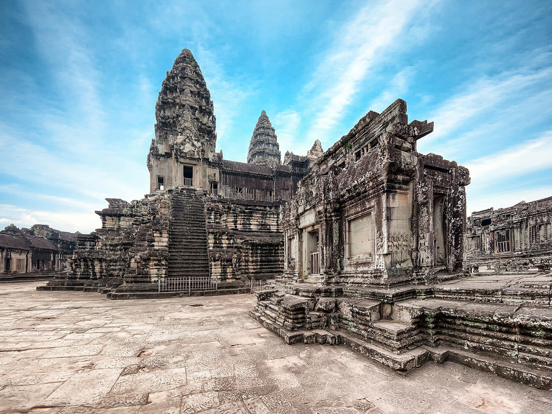 Majestic Angkor Thom Ruins Under Azure Skies