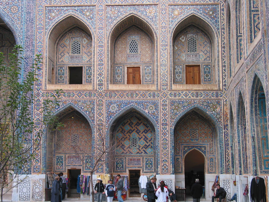 Majestic Architectural Design Of Sherdor Madrasah In Samarkand Background