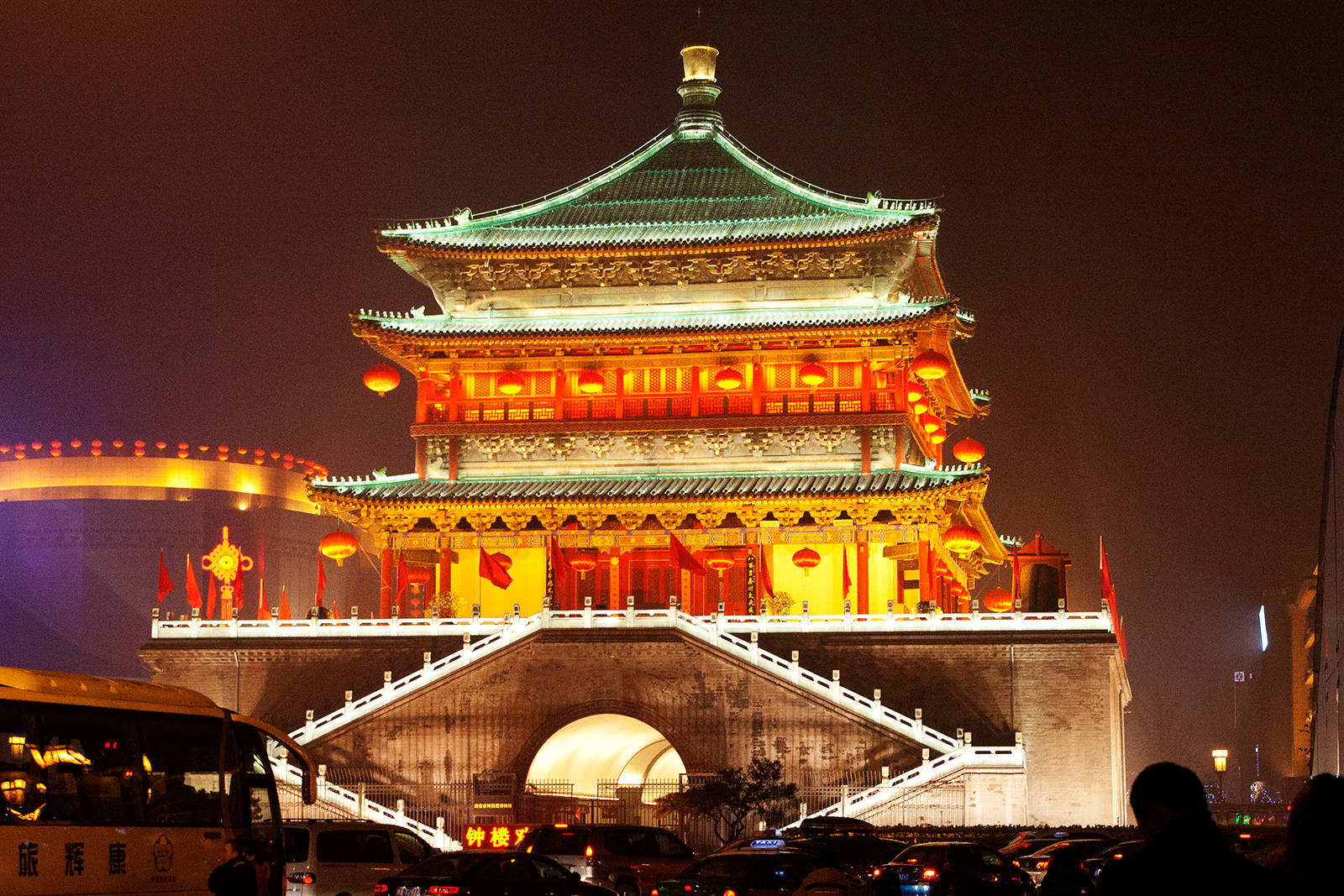 Majestic Bell Tower Illuminated At Night In Xian City Background