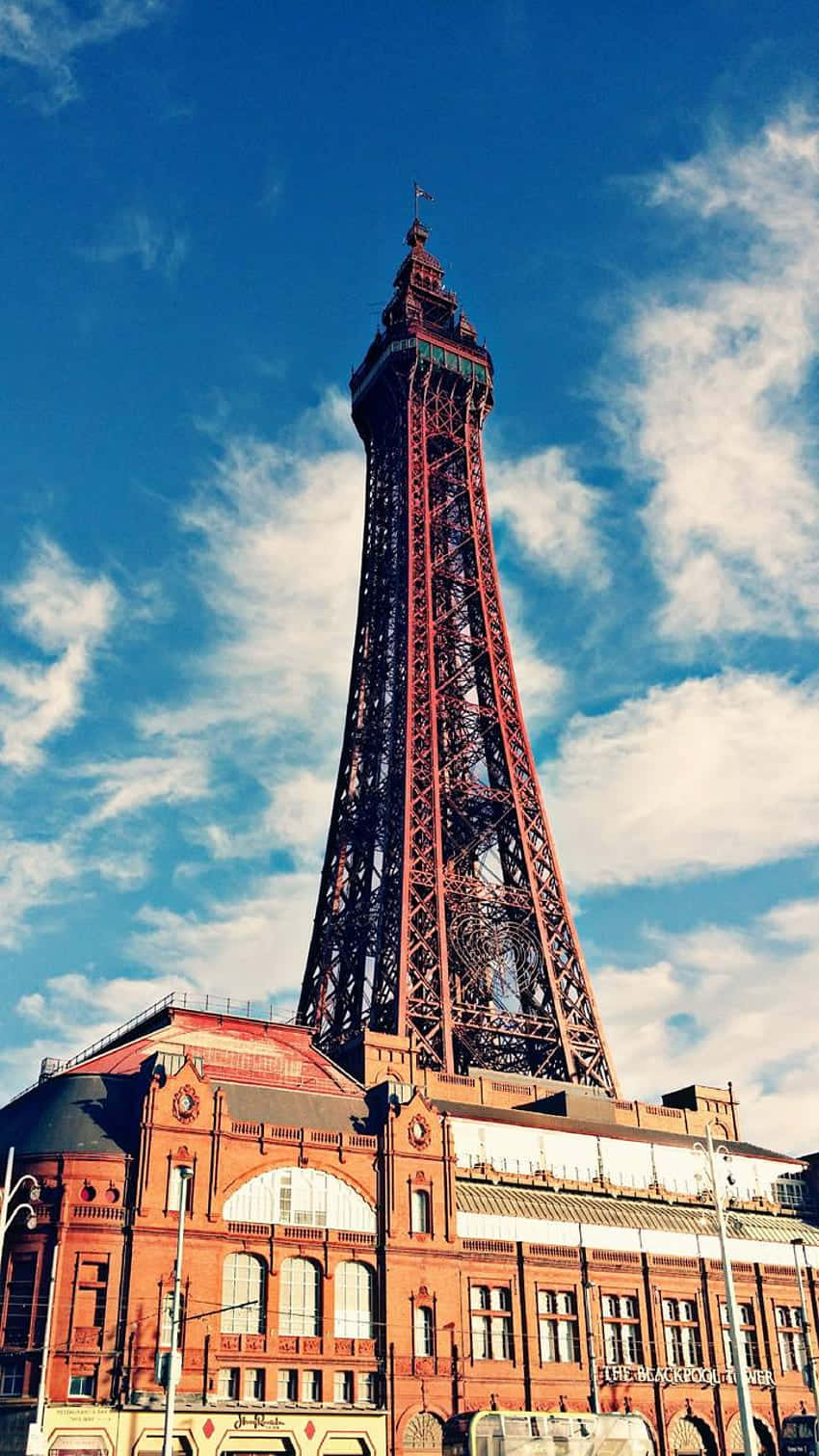 Majestic Blackpool Tower Against A Stunning Sunset Background
