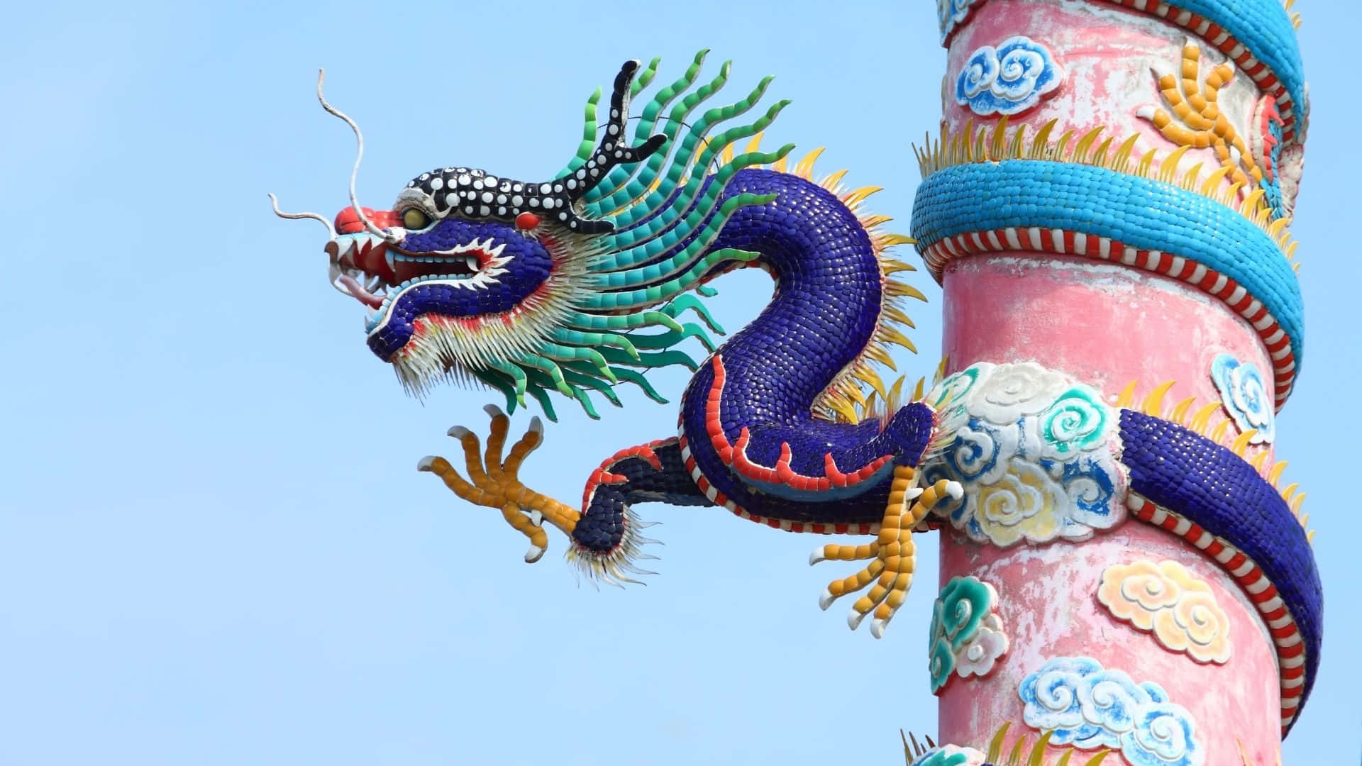 Majestic Blue Dragon Perched On A Cliff Background