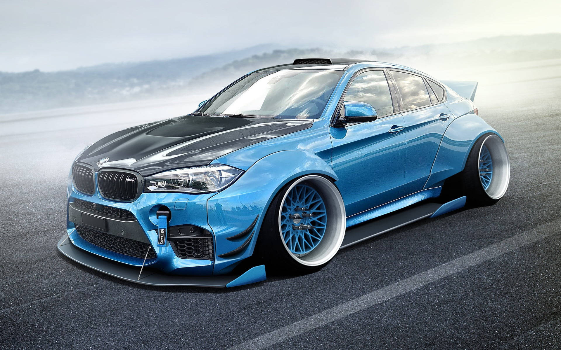 Majestic Bmw X6 M In Icy Blue Color Background