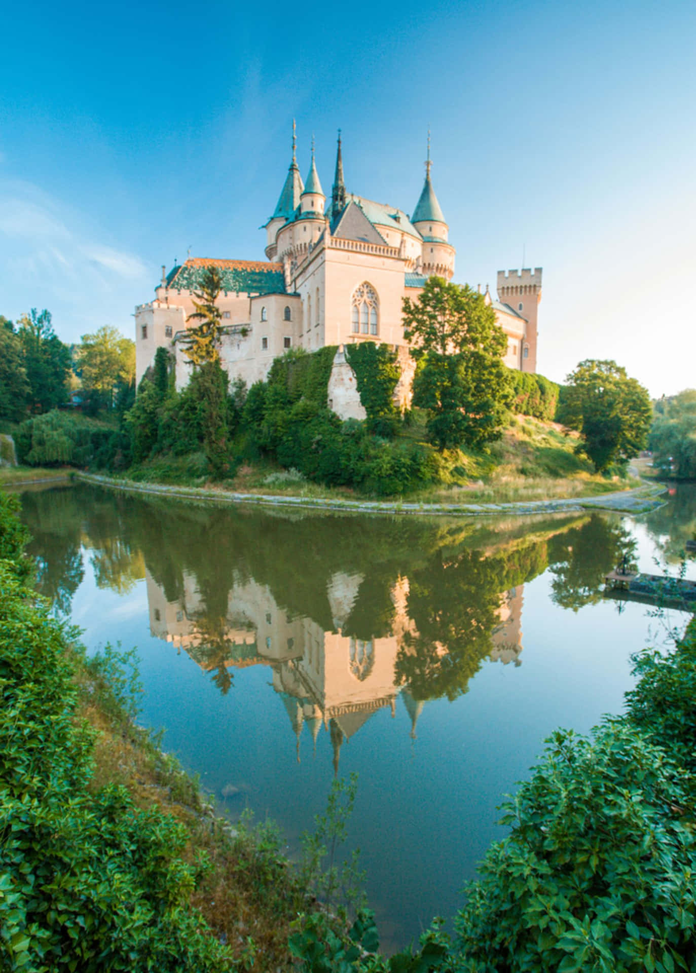 Majestic Bojnice Castle Under Clear Blue Sky Background