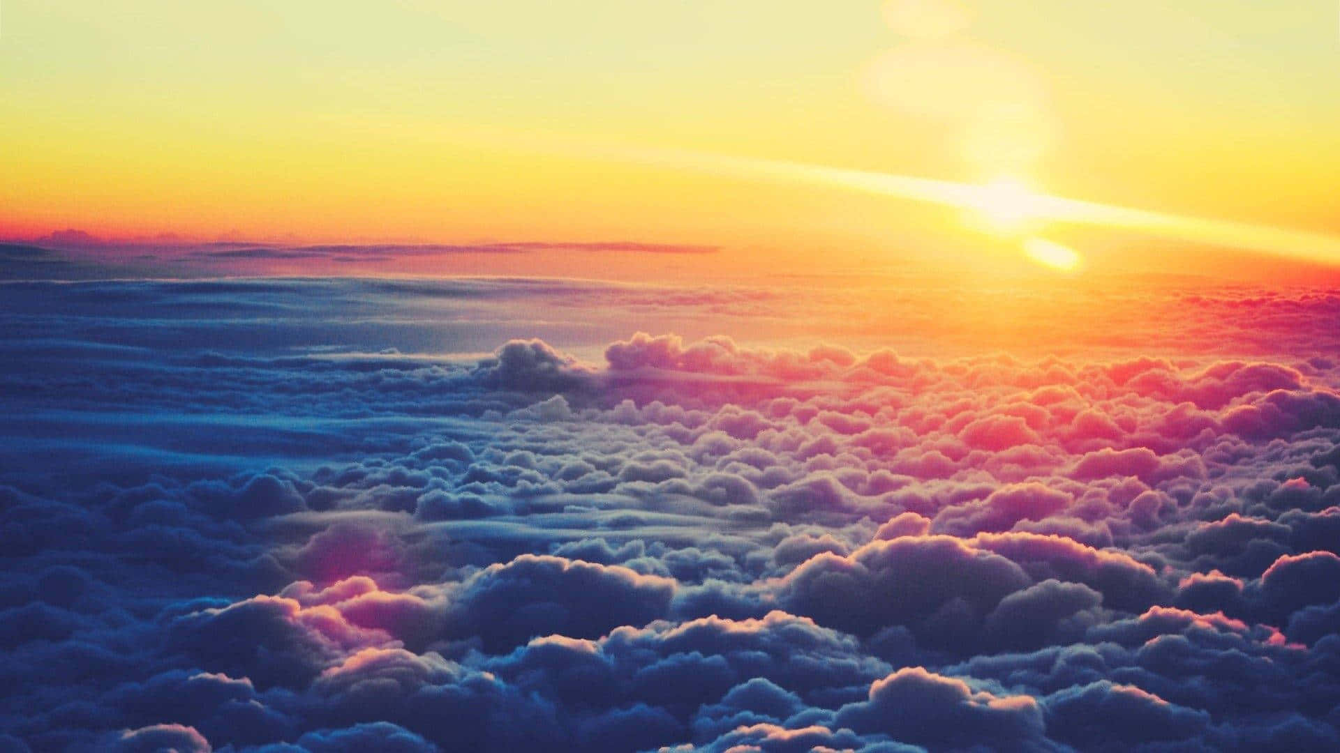 Majestic Cloudscape Over Serene Wilderness Landscape Background