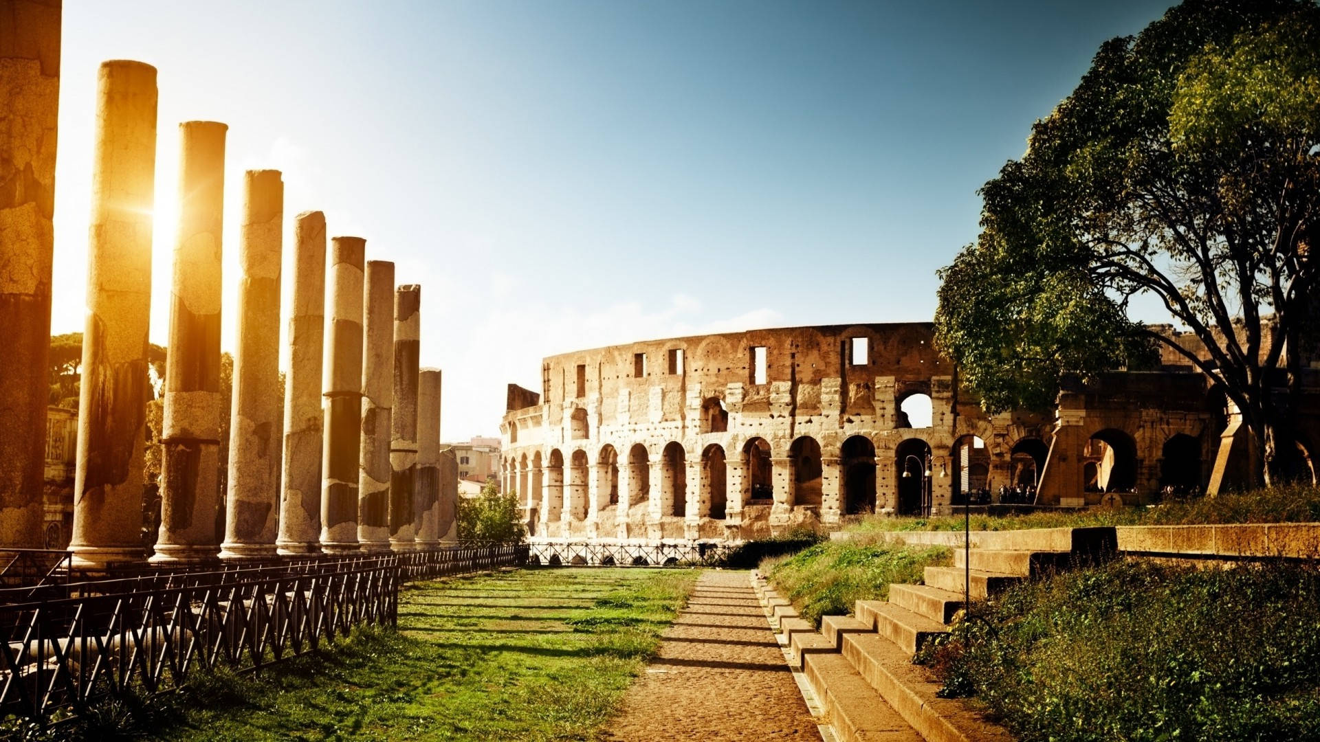 Majestic Colosseum At Sunset Background