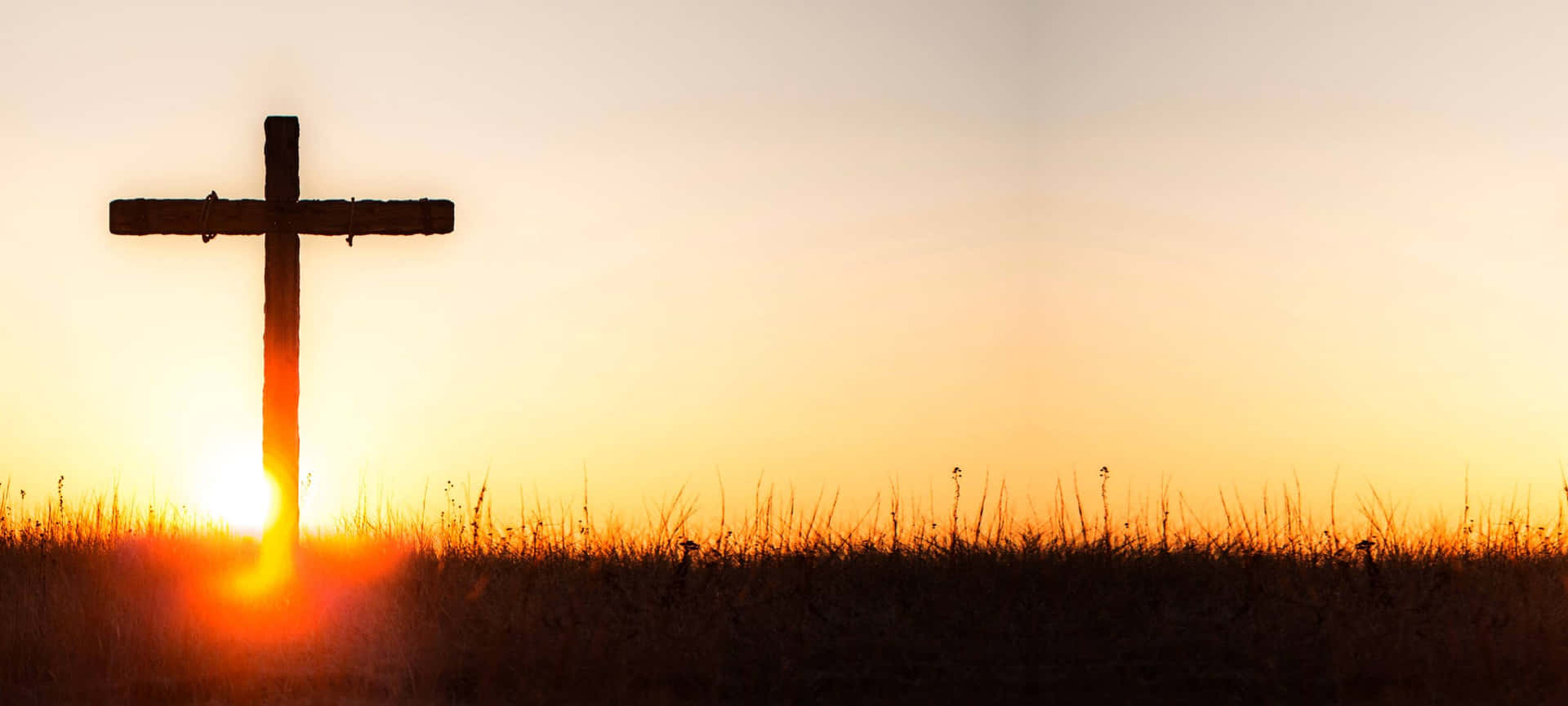 Majestic Cool Cross In A Serene Landscape Background