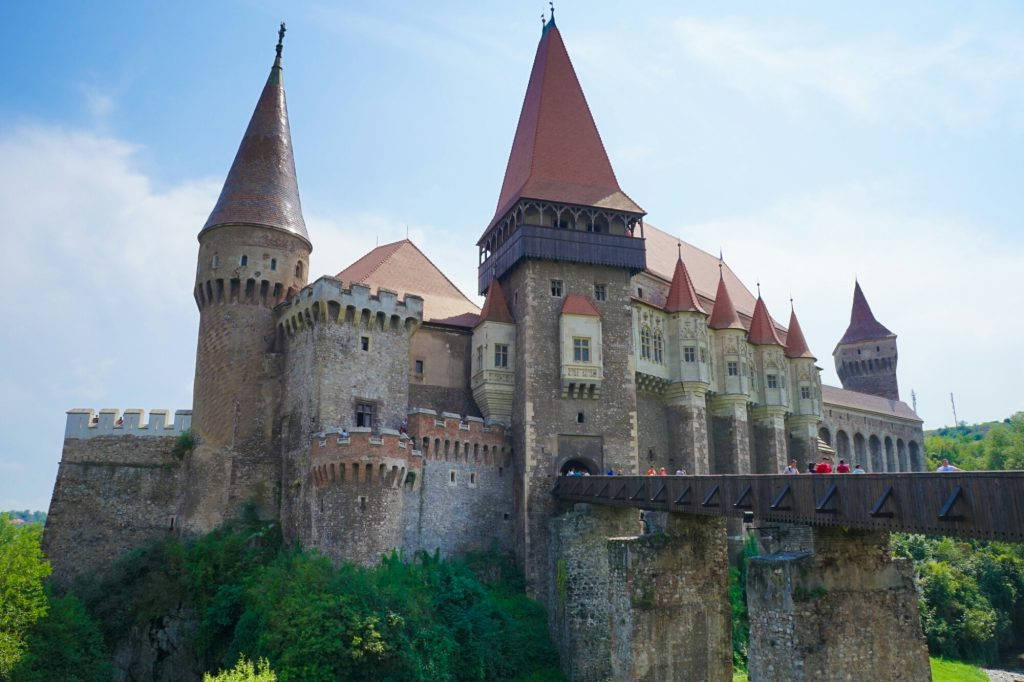 Majestic Corvin Castle In Romania Background