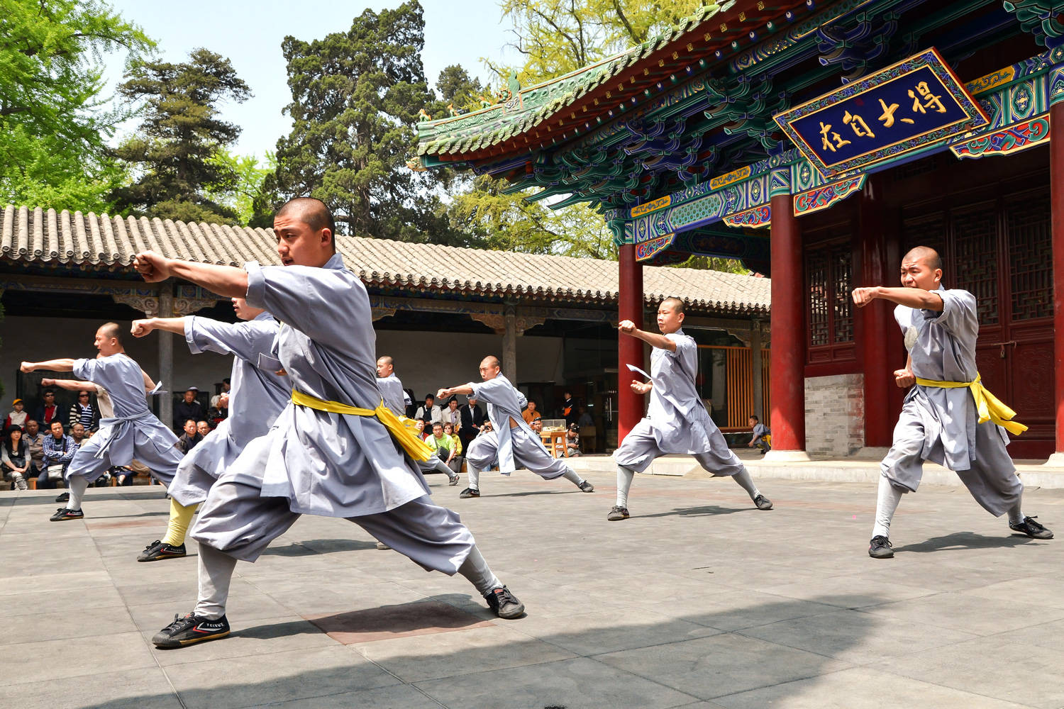 Majestic Display Of Kung Fu Skills By Shaolin Temple Monks Background