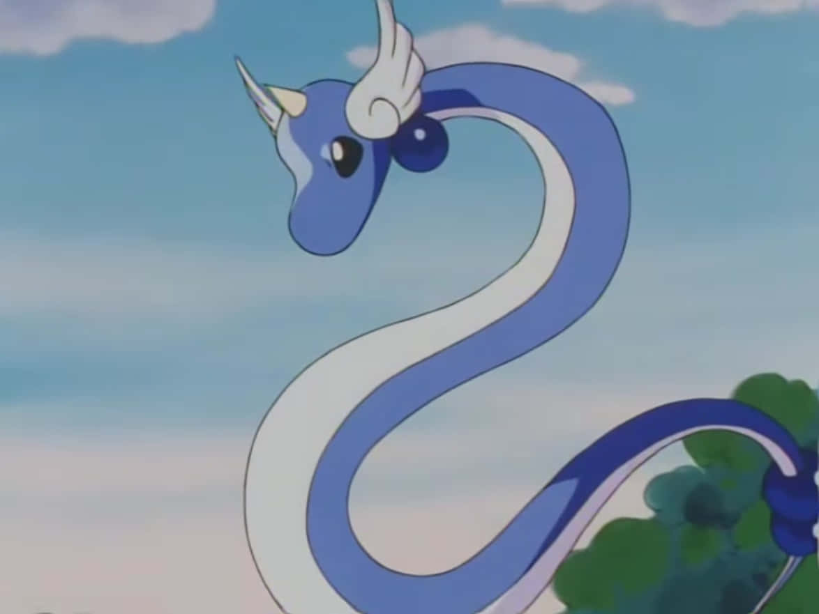 Majestic Dragonair Basking In The Azure Sky Background