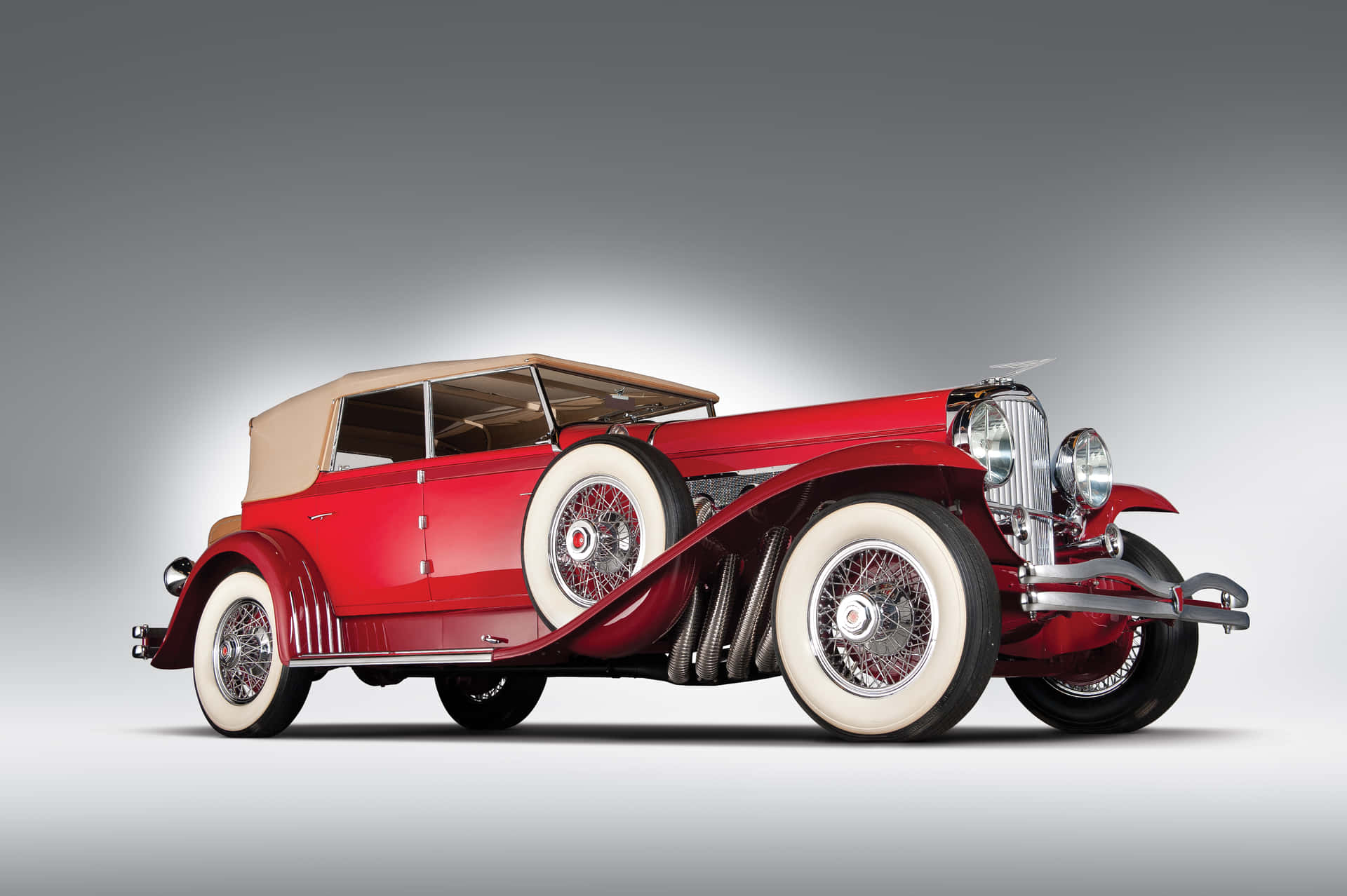 Majestic Duesenberg Model J - The Epitome Of Vintage Luxury Cars Background