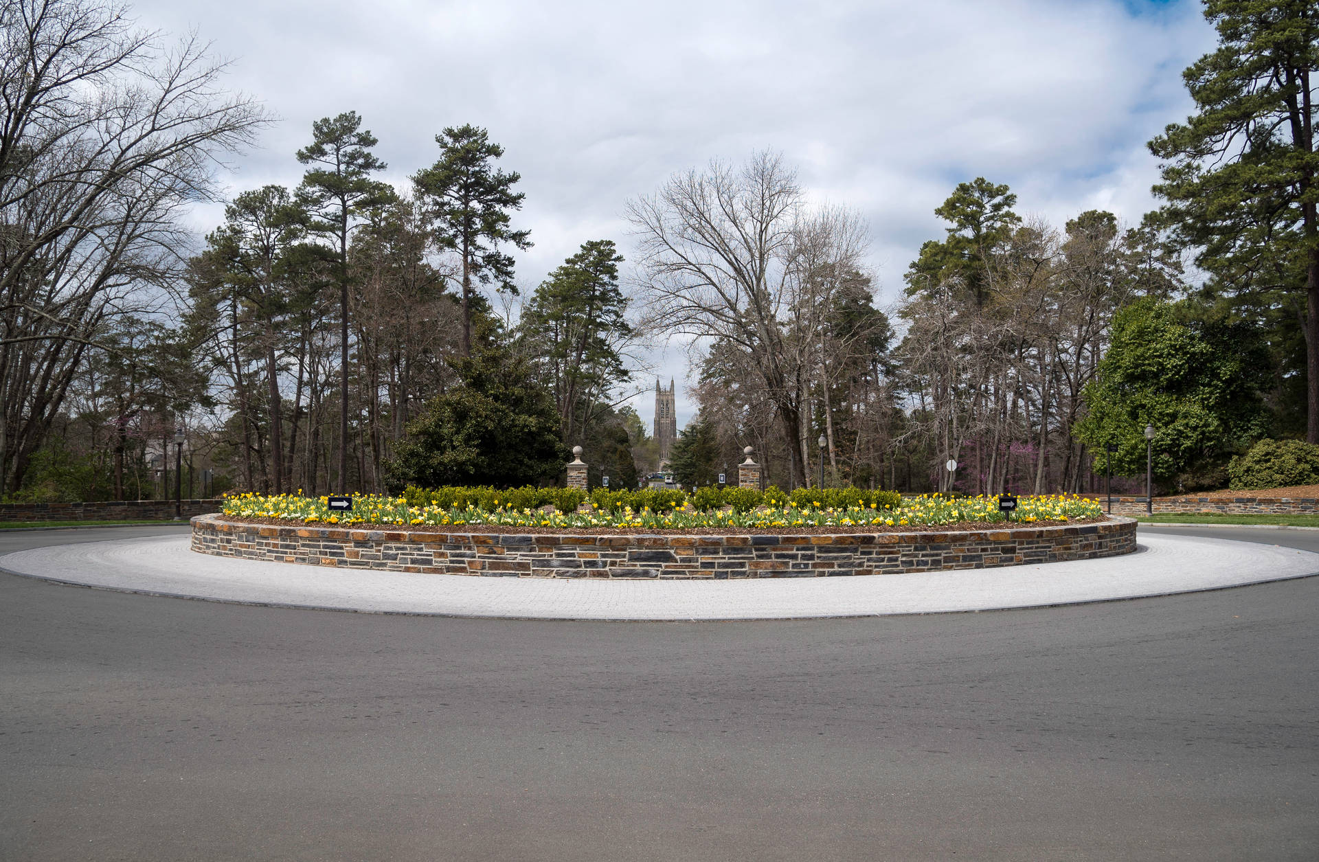 Majestic Duke University Campus Surrounded By Lush Greenery Background