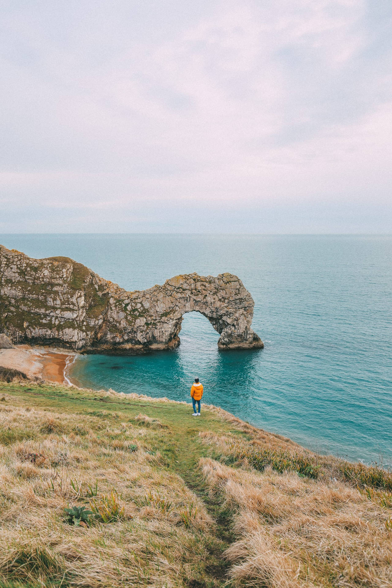 Majestic Durdle Door Natural Limestone Arch, Uk Background