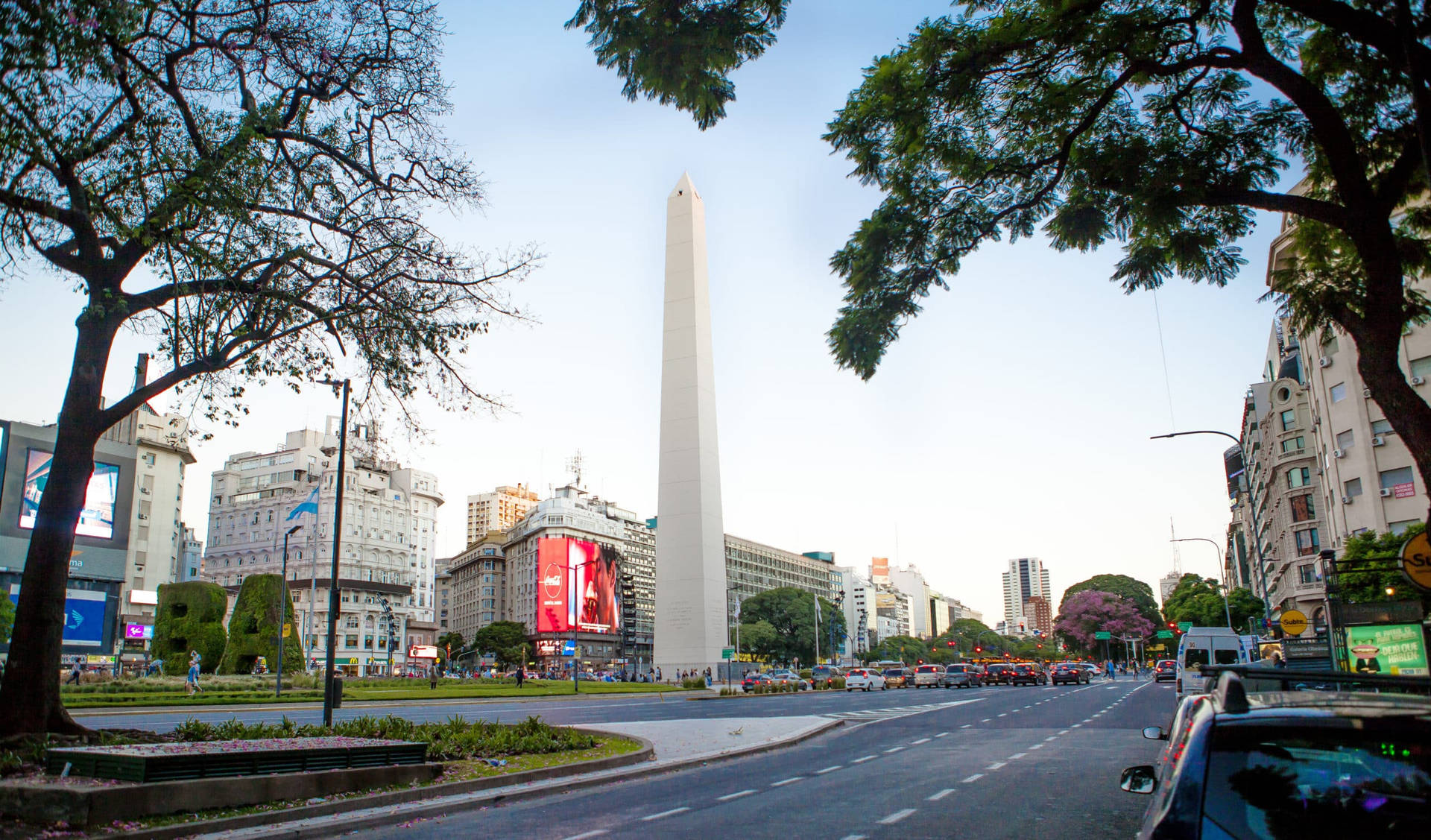 Majestic El Obelisco Dominating The Skyline Of Buenos Aires Background