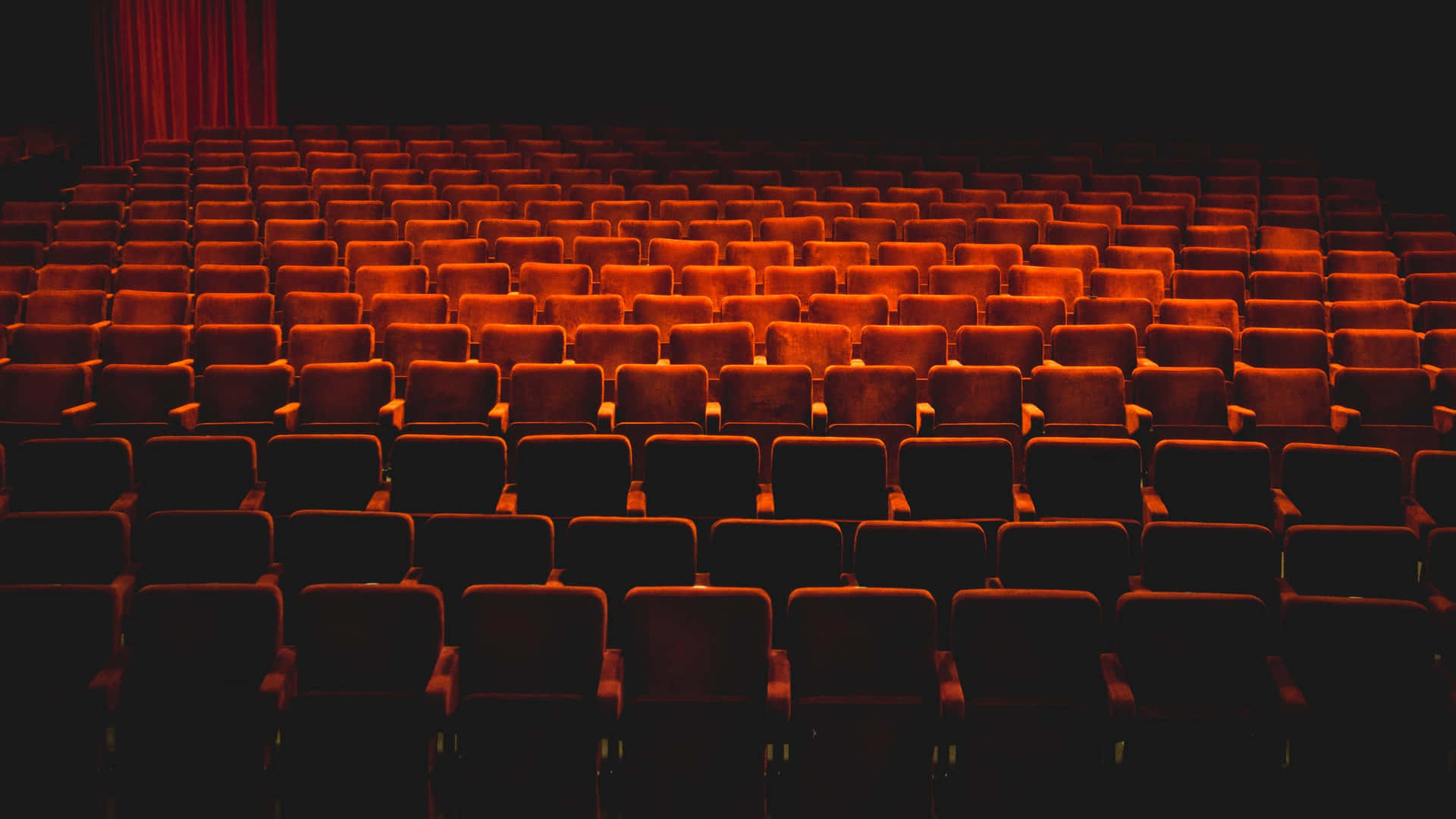 Majestic Empty Theater With Red Chairs