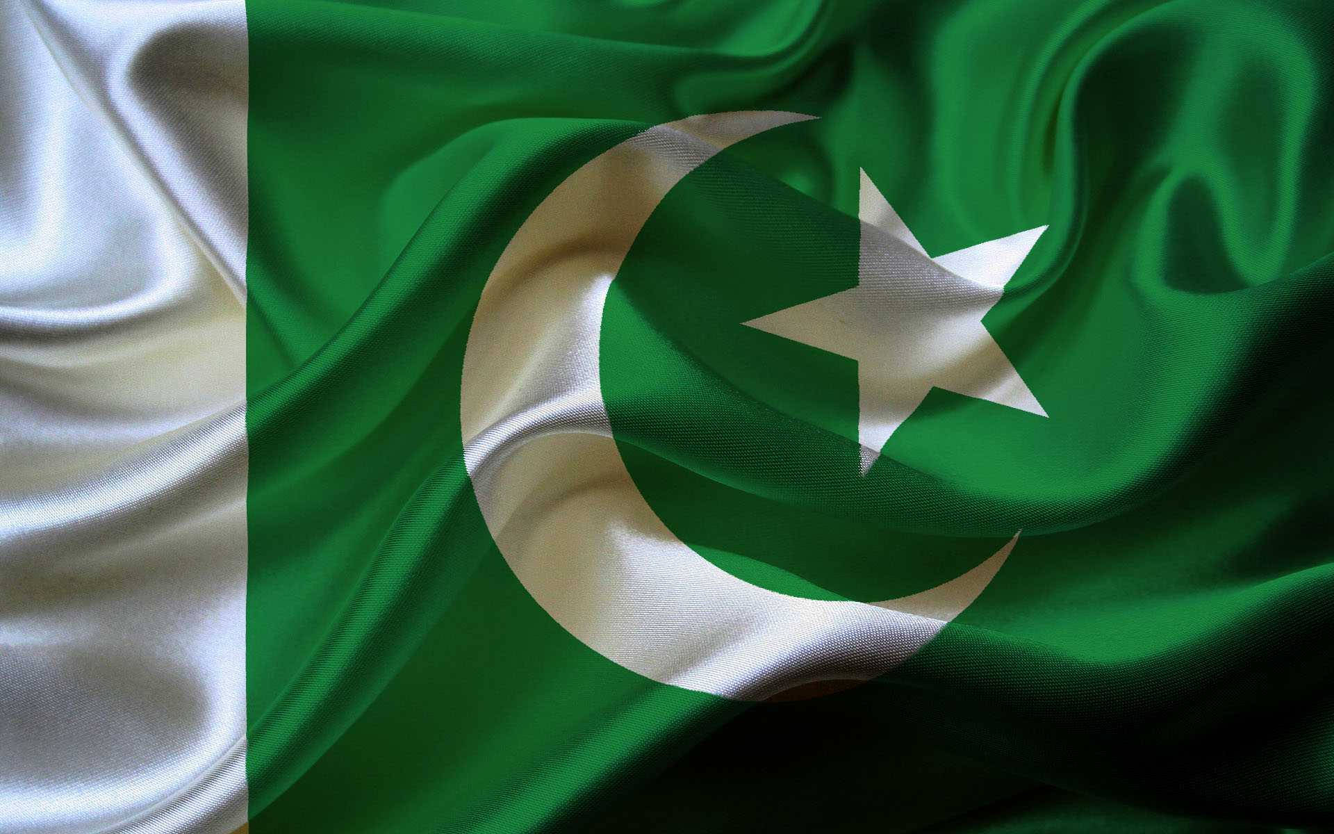 Majestic Folds On The Vibrant Pakistan Flag Background