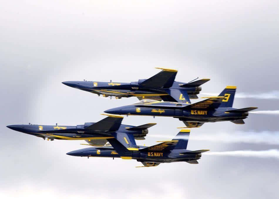 Majestic Formation Of Blue Angels In Sky Background