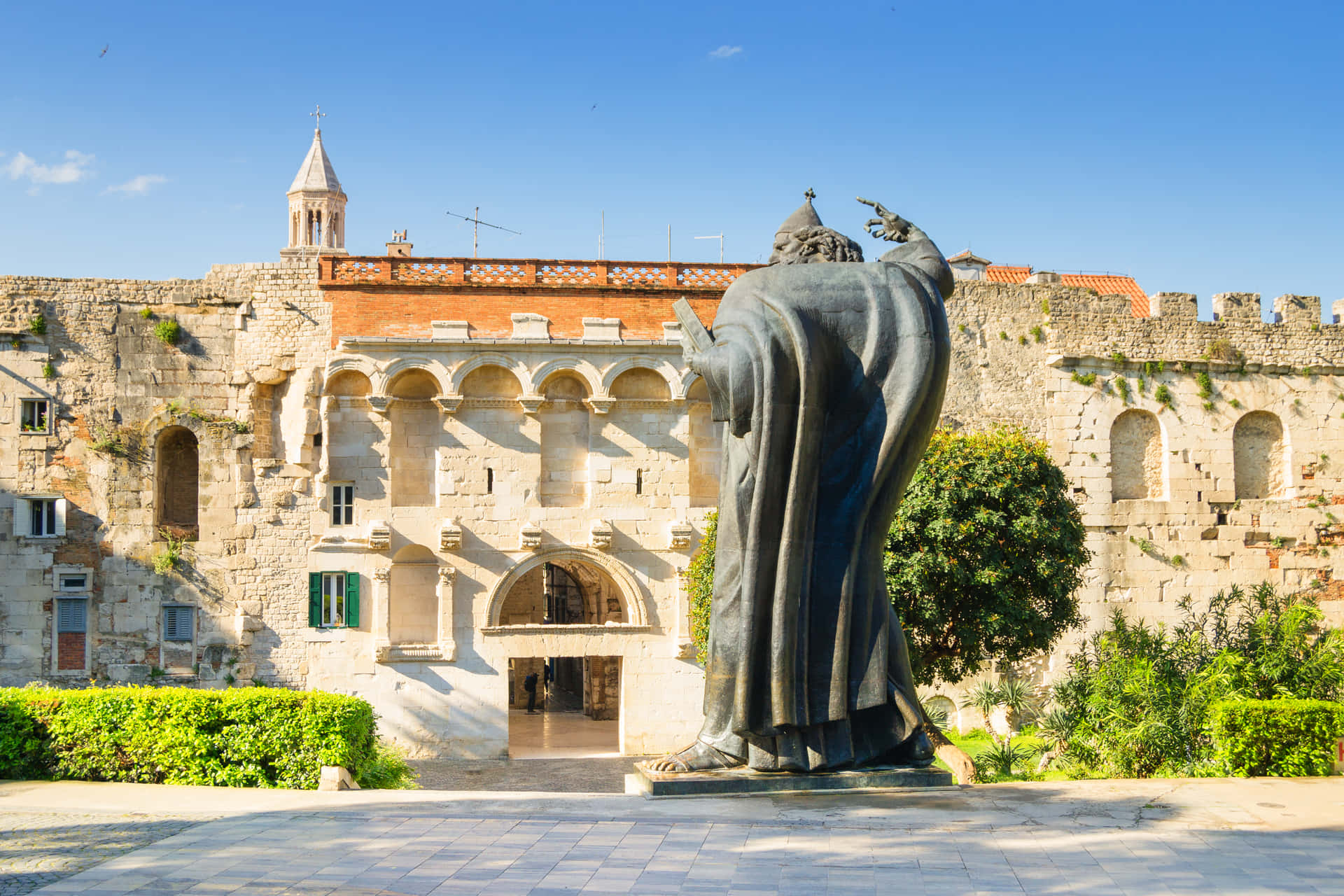 Majestic Front View Of Diocletian's Palace Golden Gate Background