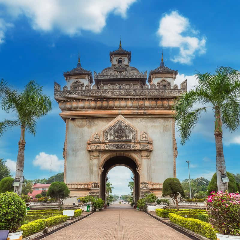 Majestic Front-view Of The Patuxai Monument In Hdr Photography Background