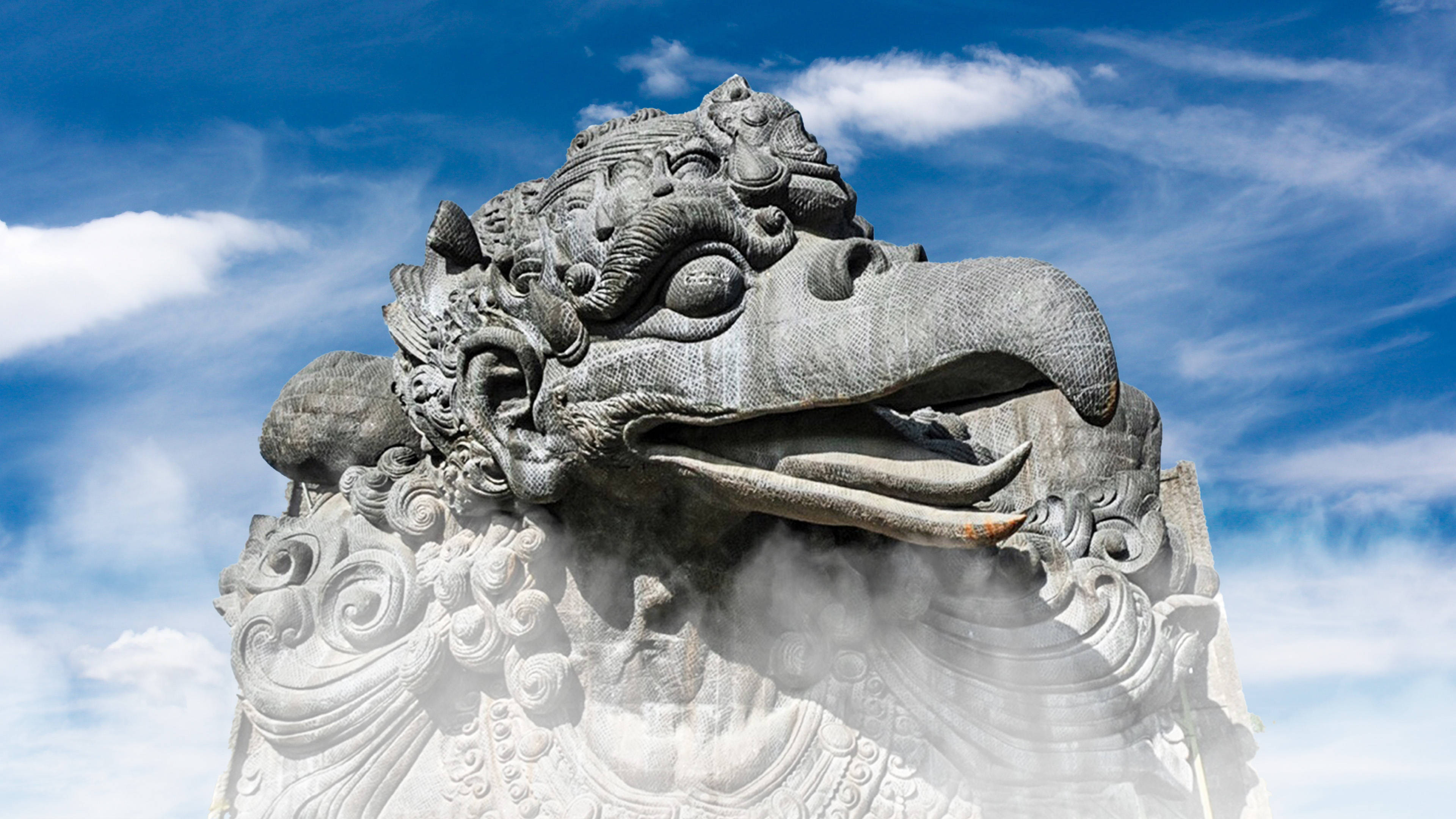 Majestic Garuda Head Sculpture Background