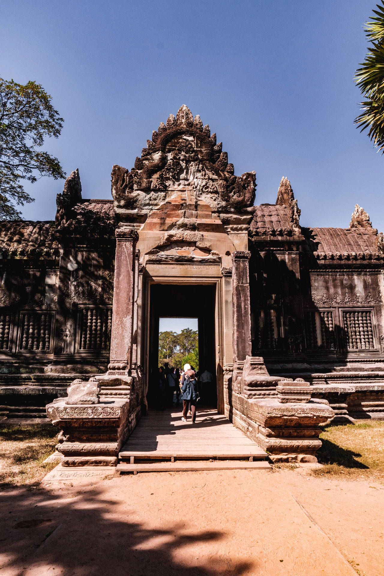 Majestic Gateway At Angkor Wat, Cambodia Background