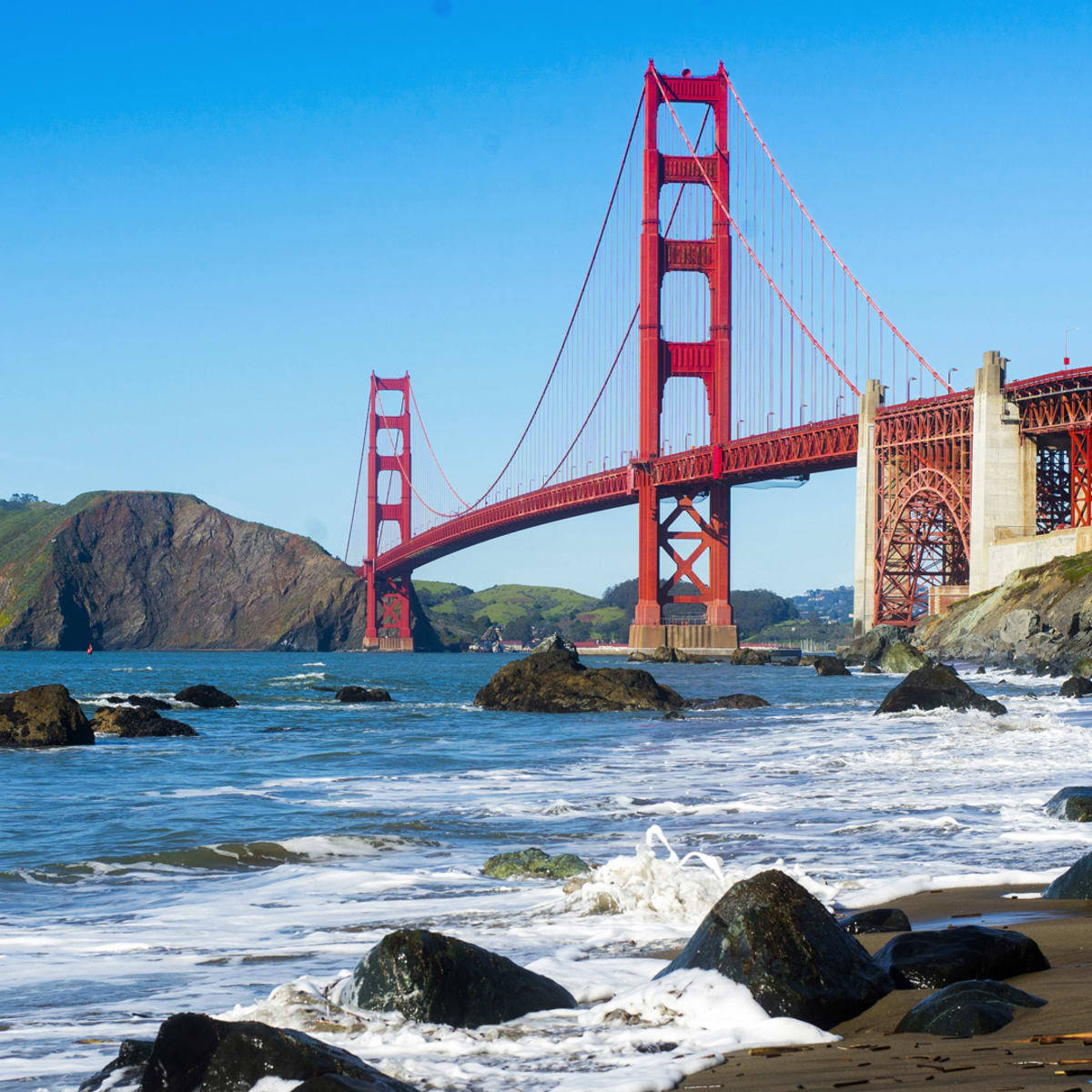 Majestic Golden Gate Bridge Overlooking The Rocky Bay