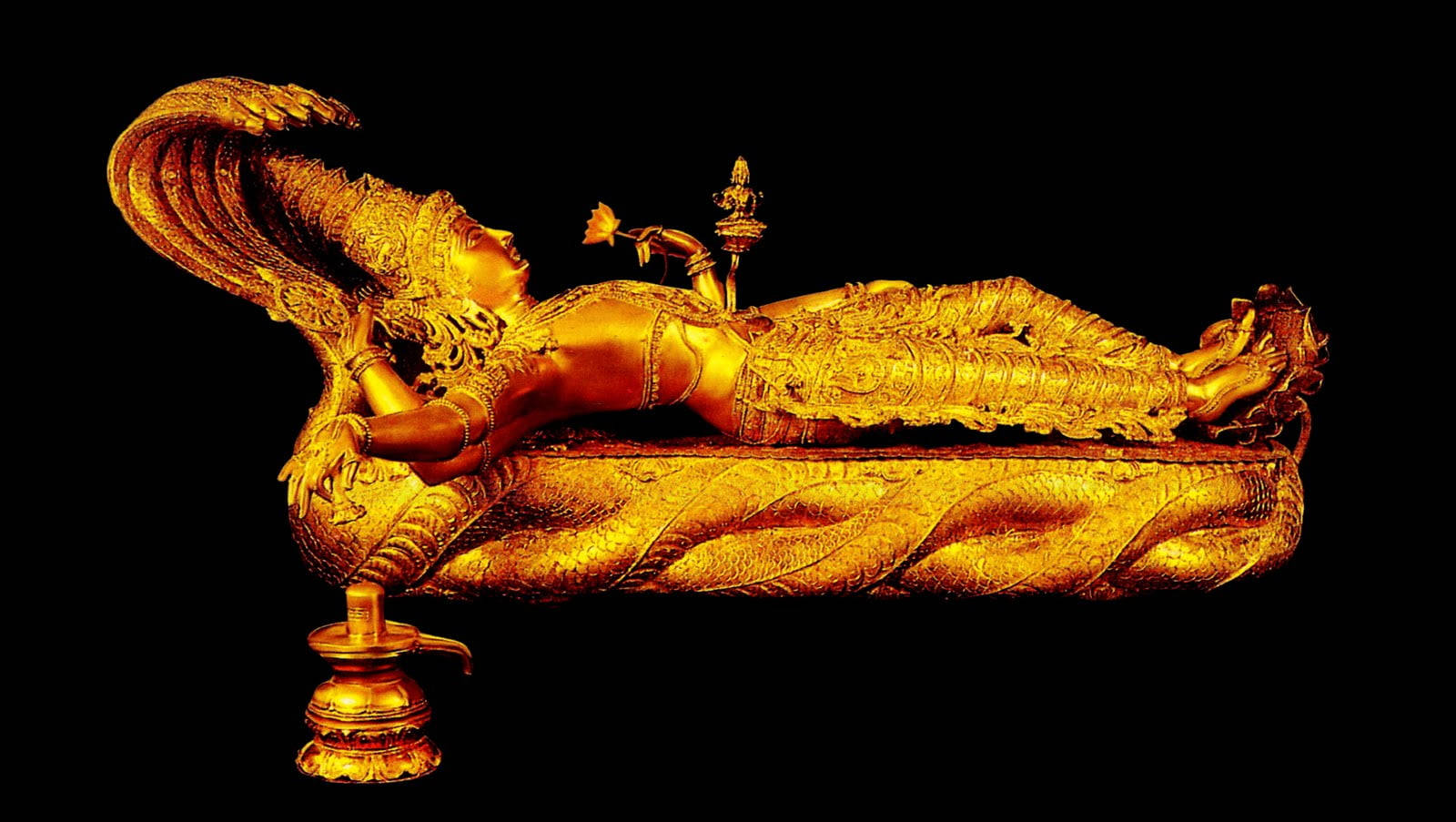 Majestic Golden Statue Of Lord Vishnu Background