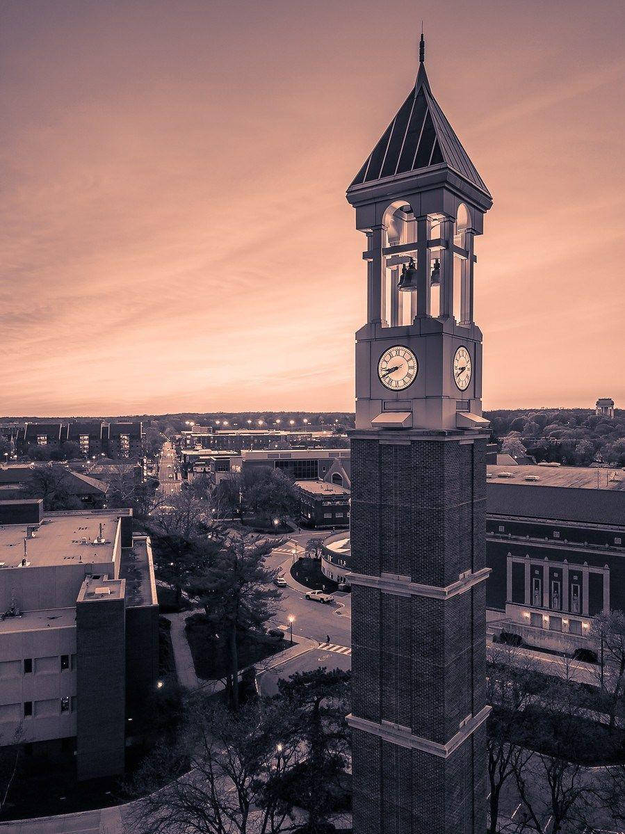 Majestic Grayscale View Of The Iconic Bell Tower At Purdue University Background