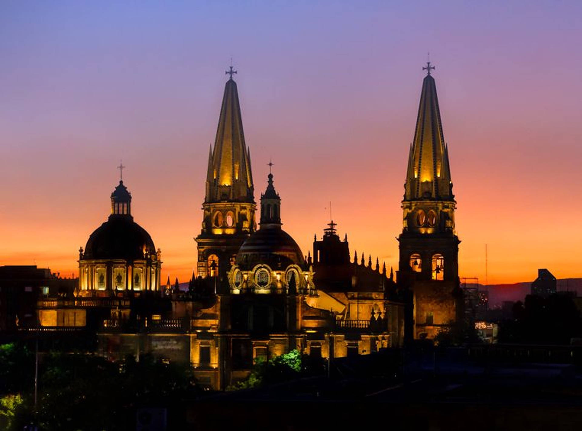 Majestic Guadalajara Cathedral Under A Radiant Sky Background
