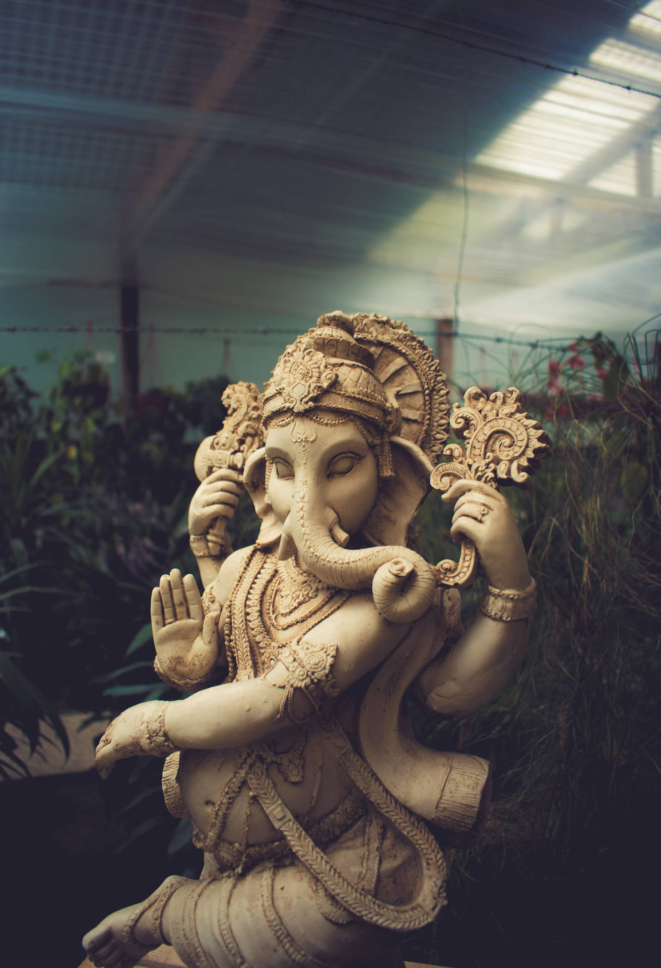 Majestic Hd Image Of Cement Ganesha Statue Background