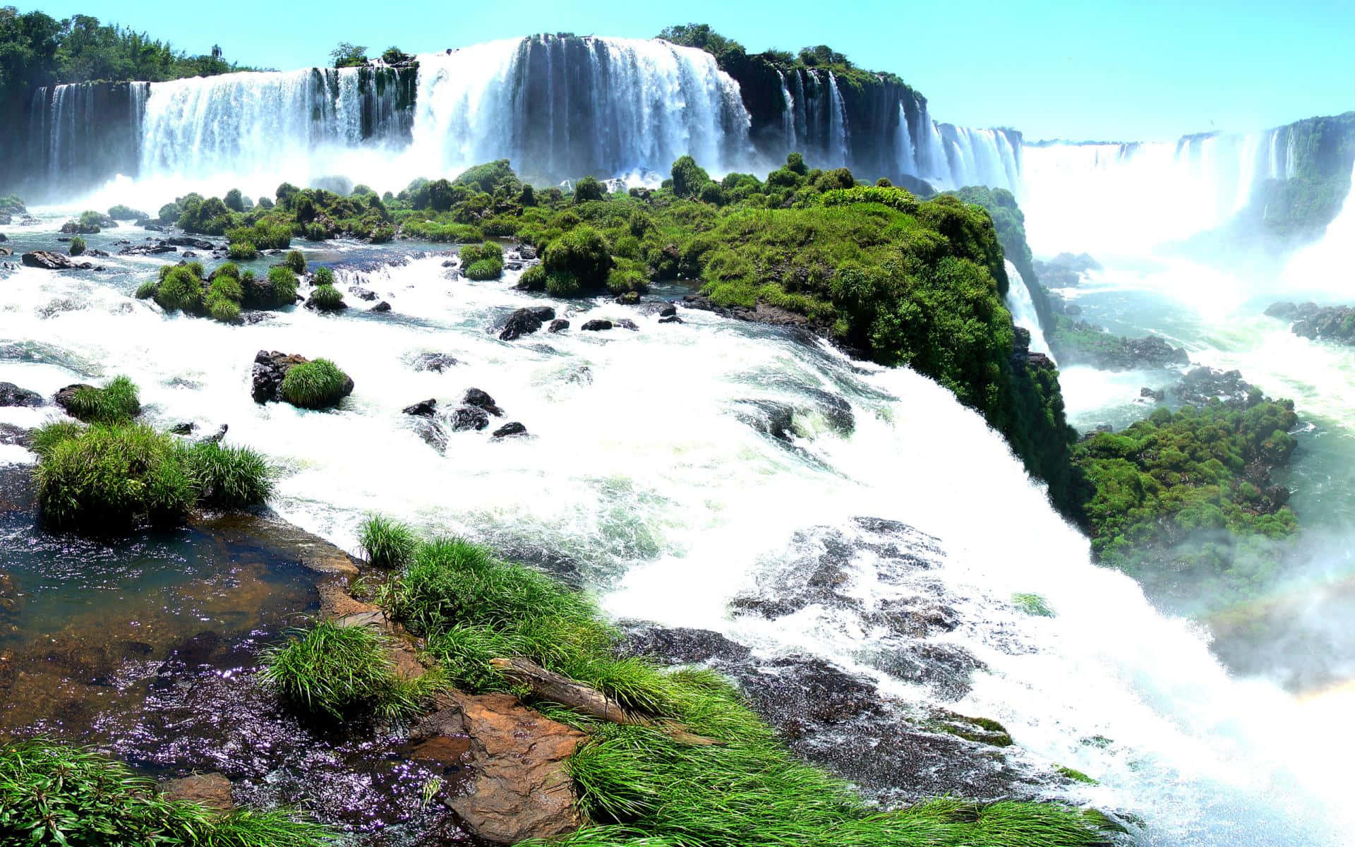 Majestic Iguazu Falls - A Nature's Wonder Background