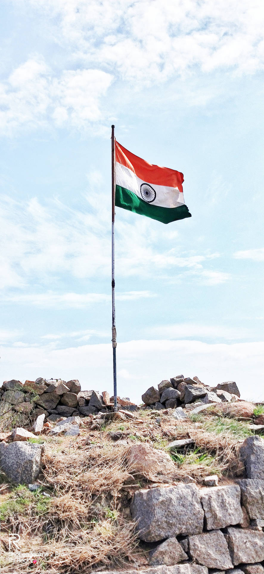 Majestic Indian Flag Adorning The Rocky Landscape In 4k Background
