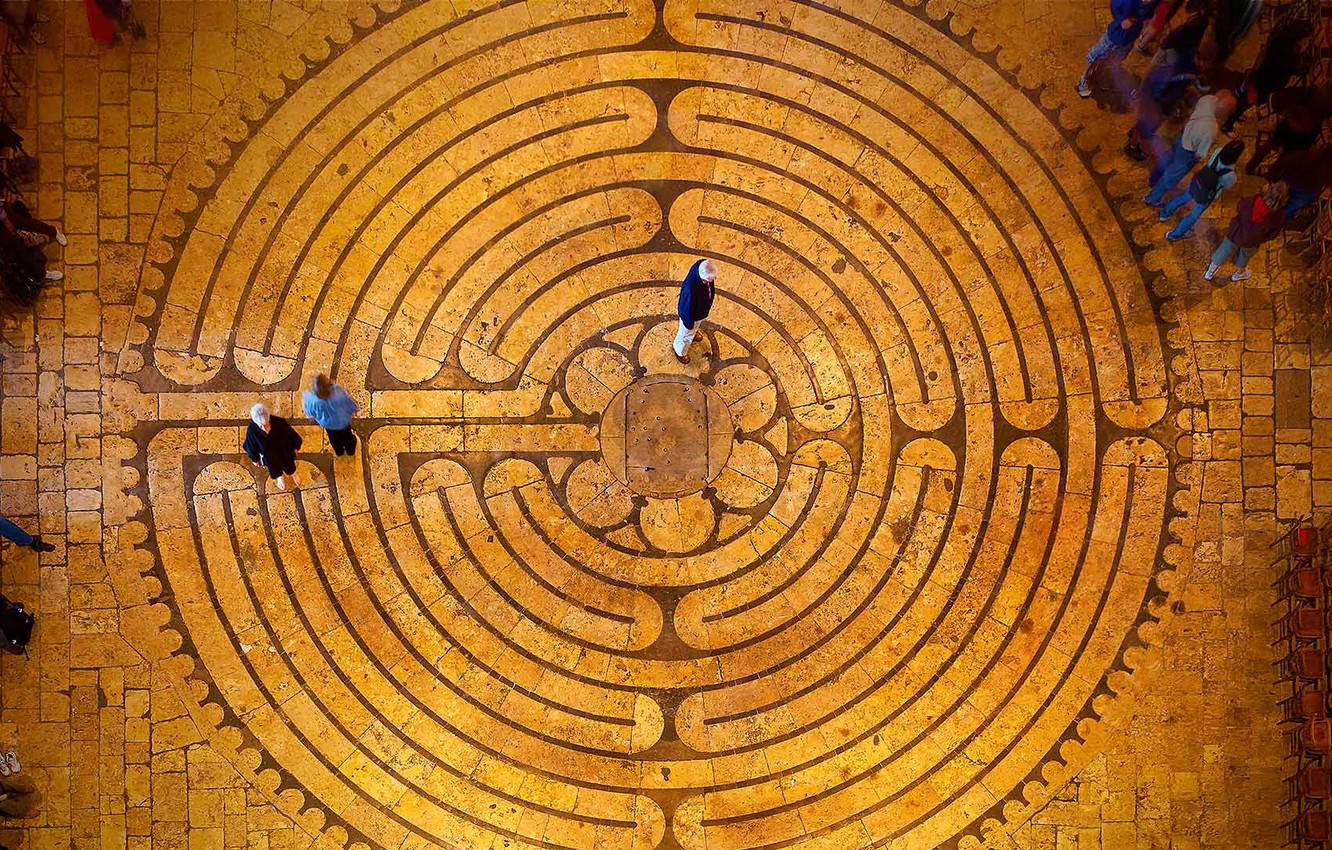 Majestic Interior And Intricate Floor Tiles Of Chartres Cathedral Background