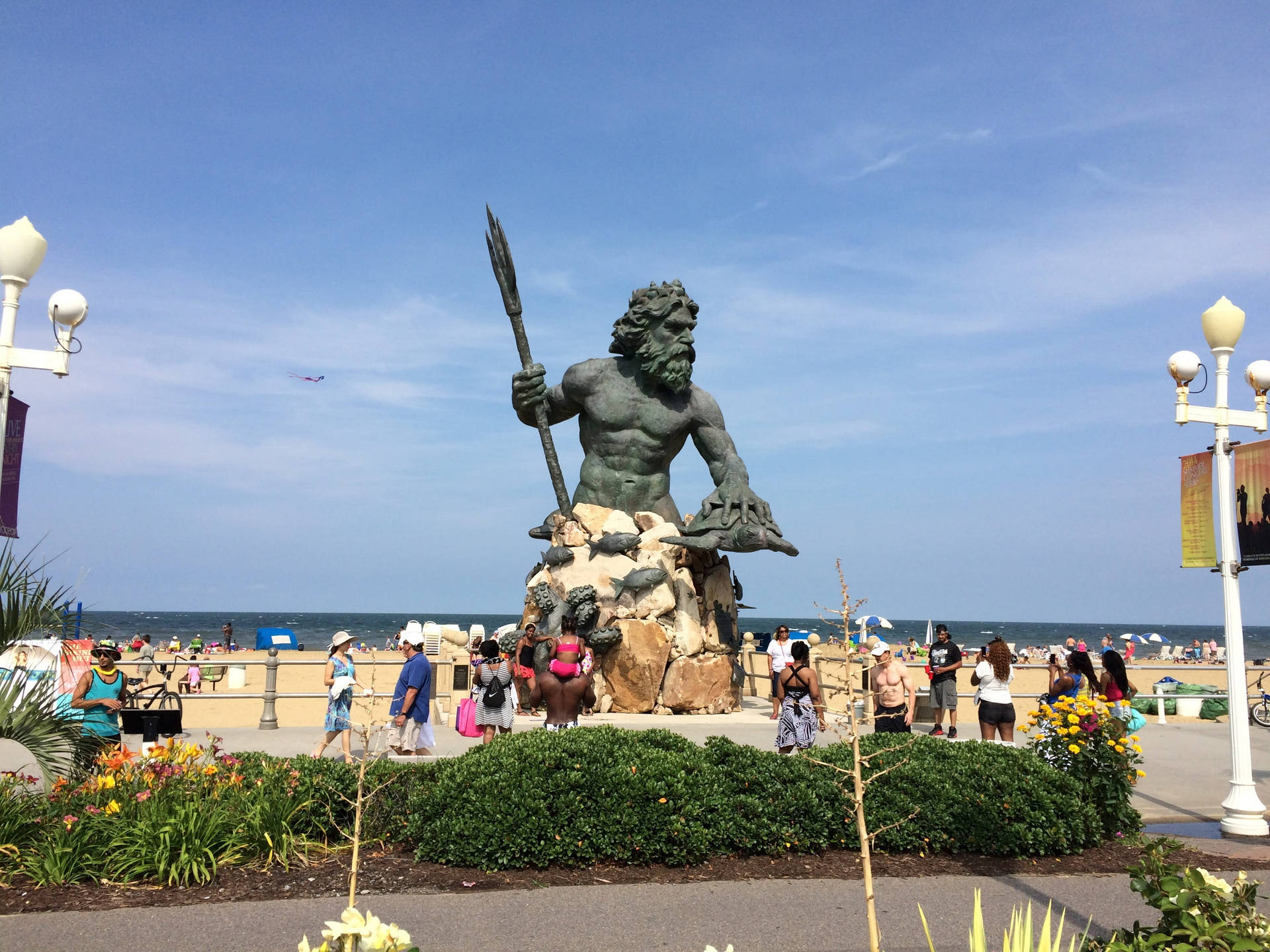 Majestic King Neptune Statue At Virginia Beach Background