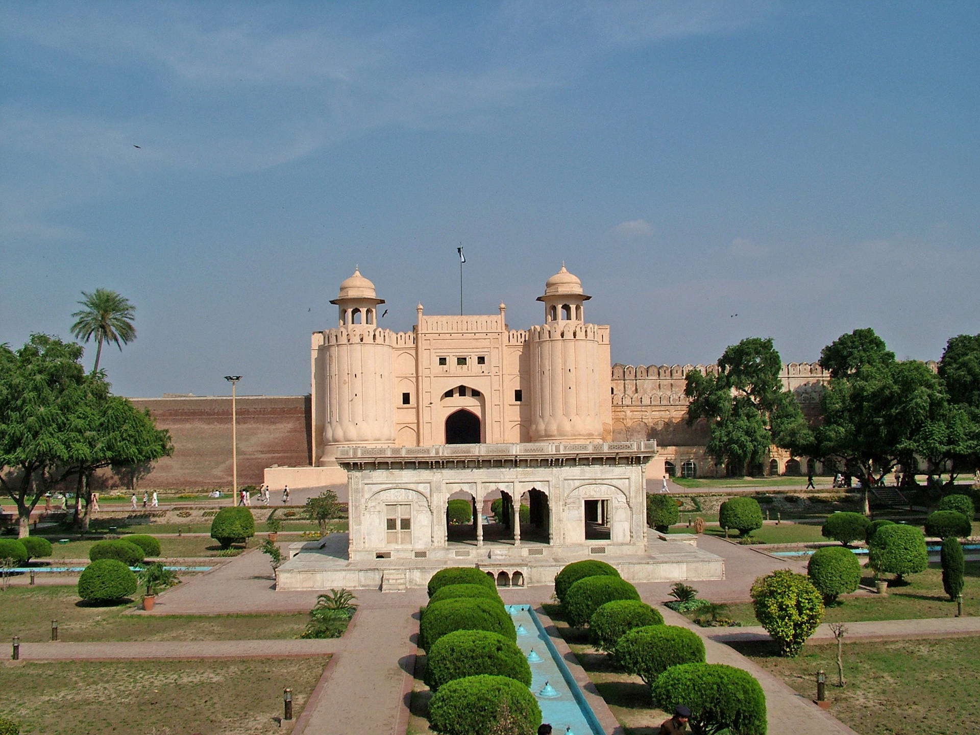 Majestic Lahore Fort With Hazuri Bagh In The Foreground. Background
